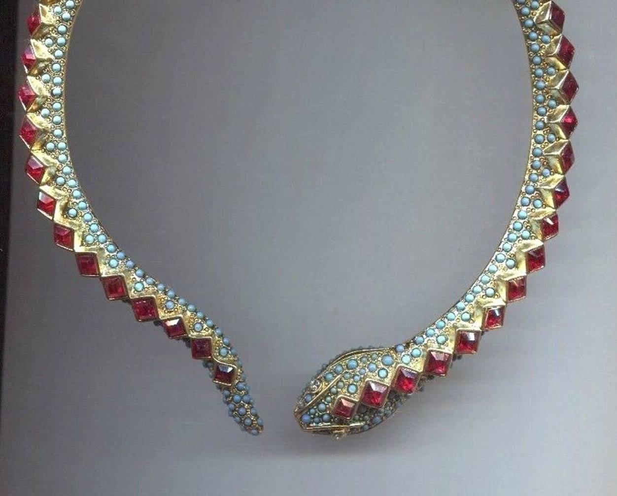 Sensational Snake Collar Necklace encrusted with Sparkling Faux Rubies and Faux Turquoise; signed on reverse: KENNETH LANE MADE IN USA; approx.  .75” wide; Classic, Stylish, Beautiful and Fun to Wear! See our matching Cuff Bracelet. 
