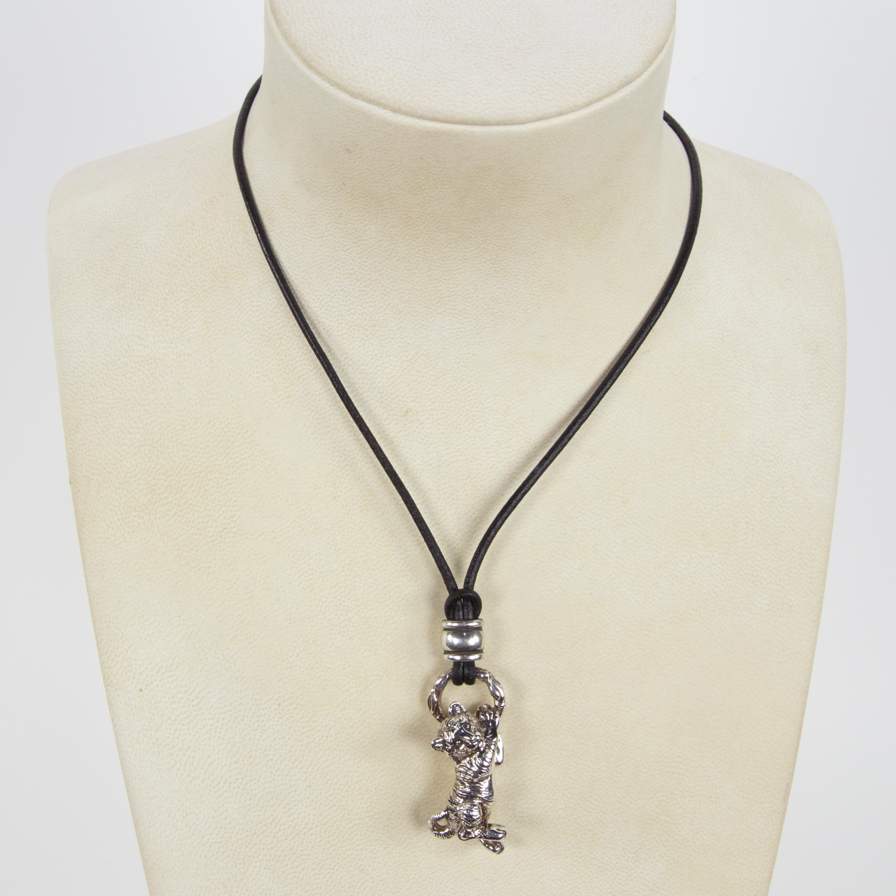 Featuring a delightfulrful Tiger Cub Pendant crafted in Sterling Silver, suspended from a leather cord; approx. 18