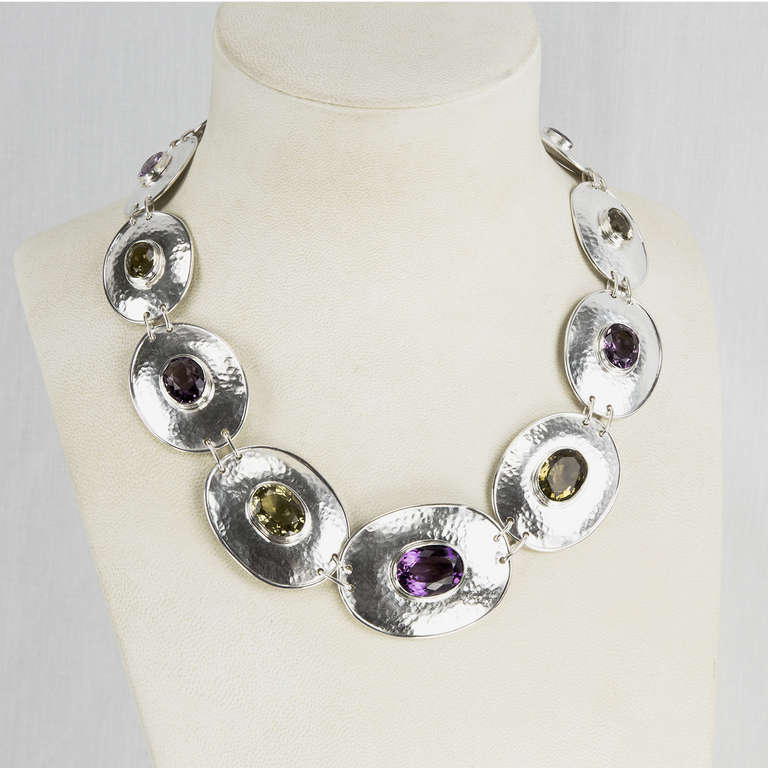 Beautiful and finely detailed Classic Mid Century Modern Sterling Silver Choker Necklace, Hand crafted and Hand hammered; centers of oval discs set with Amethyst and Citrine Gemstones; approx. total weight of stones: 90 Carat.; approx. length: