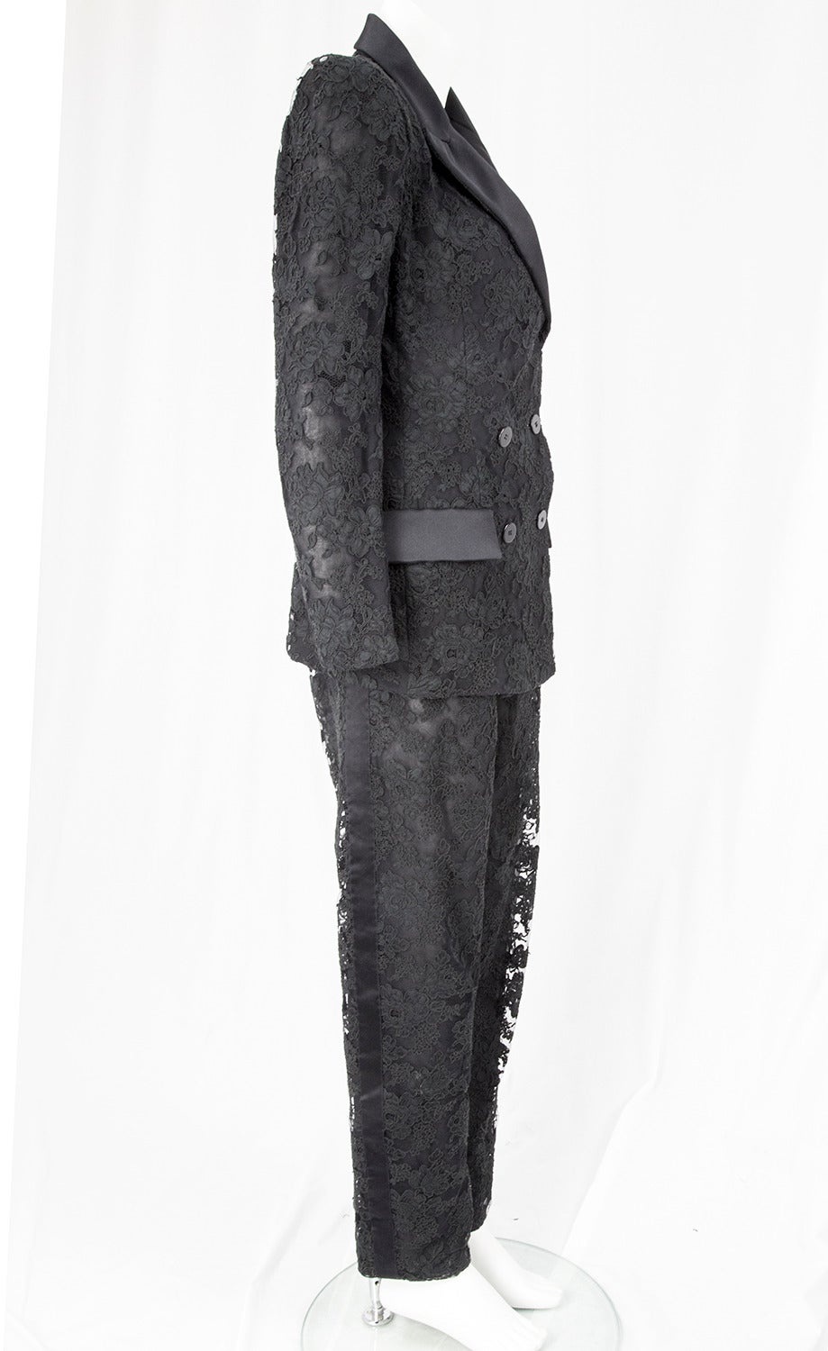 Classic Sophistication by Bill Blass…Ladies Alençon Lace Tuxedo Suit; re-embroidered Alencon Lace cocktail suit in black...Double breasted jacket fitted with front seaming, satin lapels, Satin decorative flap pockets and is fully lined in silk