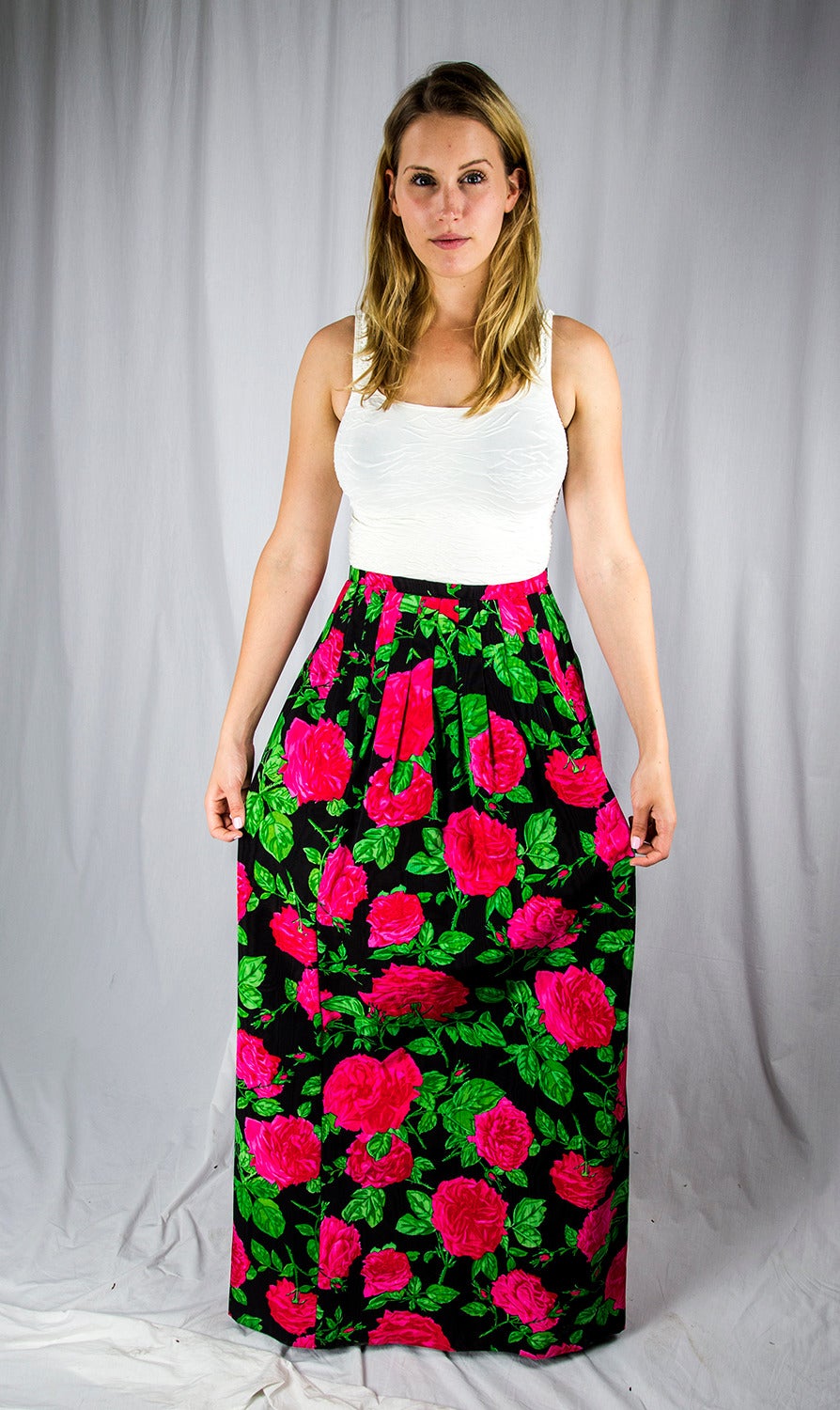 Wow! All SilkFloral Red Green and Black Pleated All Silk Long Skirt by Adolfo at Saks Fifth Avenue. Beautifully pleated front and back. Banded waist with back zipper closure and bar hook at the waist; fully lined. Go anywhere in style with this Chic