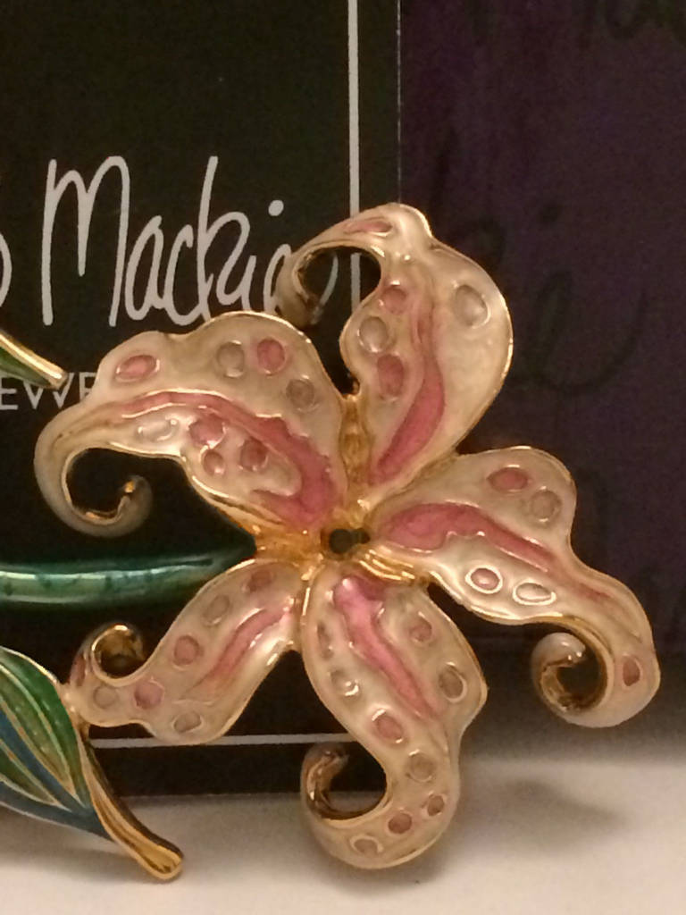 Stunning Large Pink Enamel Lily gold tone signed Bob Mackie Brooch Pin; Retired , in its original box with the original brand brochure; Signed Bob Mackie; approx. size:  4.25" x 2"