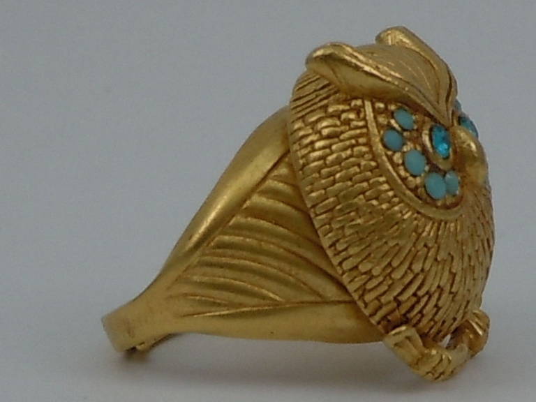 Askew London Owl Adjustable Ring; Antiqued Gold Plated Owl set with Faux Blue Zircon and Turquoise stones ; Adjustable Ring Shank; Owl Measures 1.00'' X 0.75''