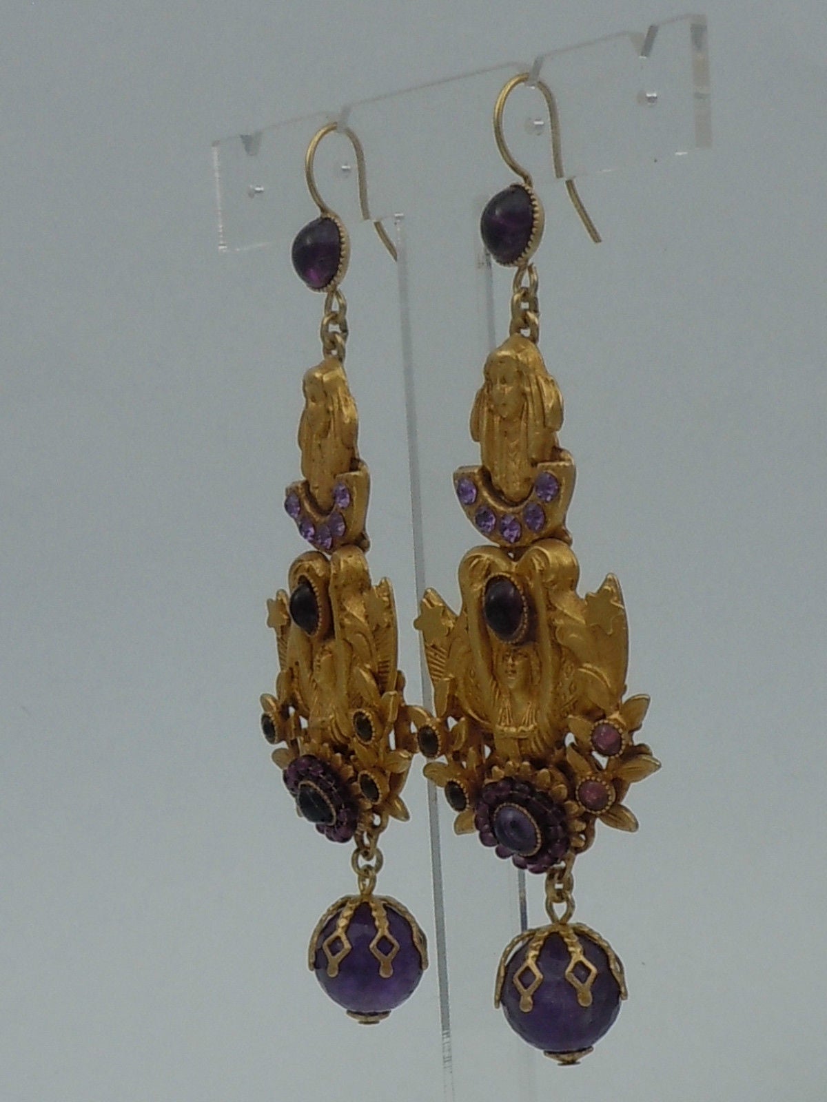 Outstanding! Antiqued Gold plated filigree bases decorated with brass maidens, leaves and stars and Amethyst glass cabochons and cardinal Chatons and tiny Amethyst glass rock beads.  Earrings have hook fittings set with Amethyst cabochons and