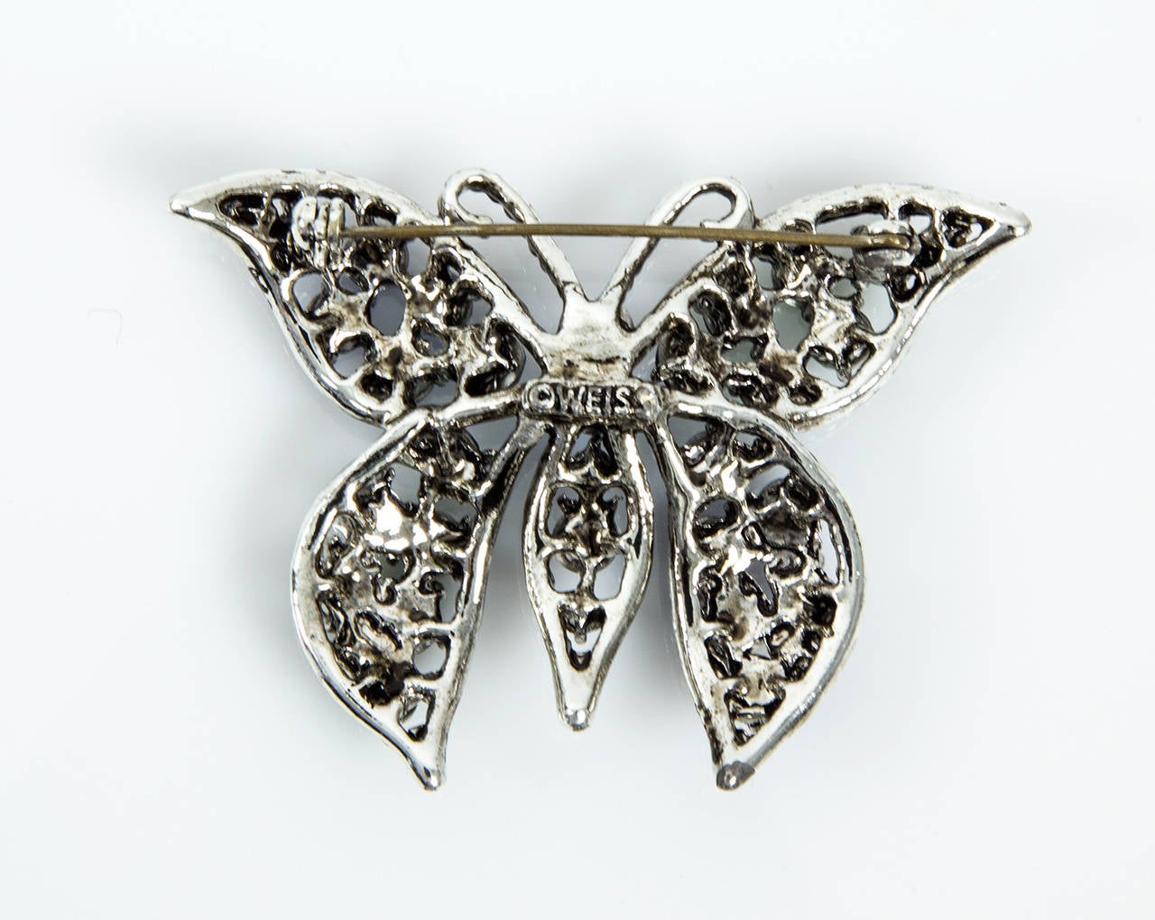 Beautiful and colorful Blue and Green Rhinestone Butterfly Brooch;  signed WEISS. Approx. size: 2.25” x 1.5”.