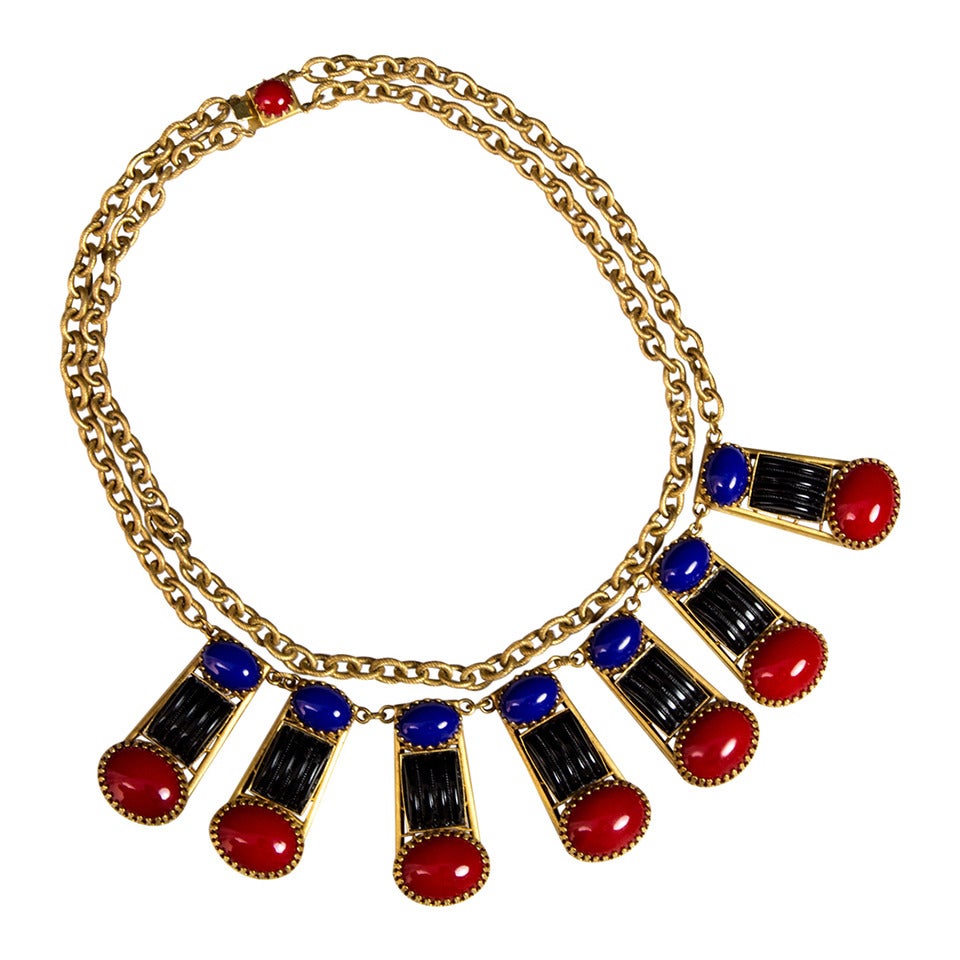 Featuring signed Askew London Antiqued Gold Plated Filigree bases decorated with vintage ridged Black Glass rectangles, Red and Blue Glass Cabochons on oval Link Chain with push in fastening.  Rectangles measure approx. 1.75'' X 0.90''; Necklace is