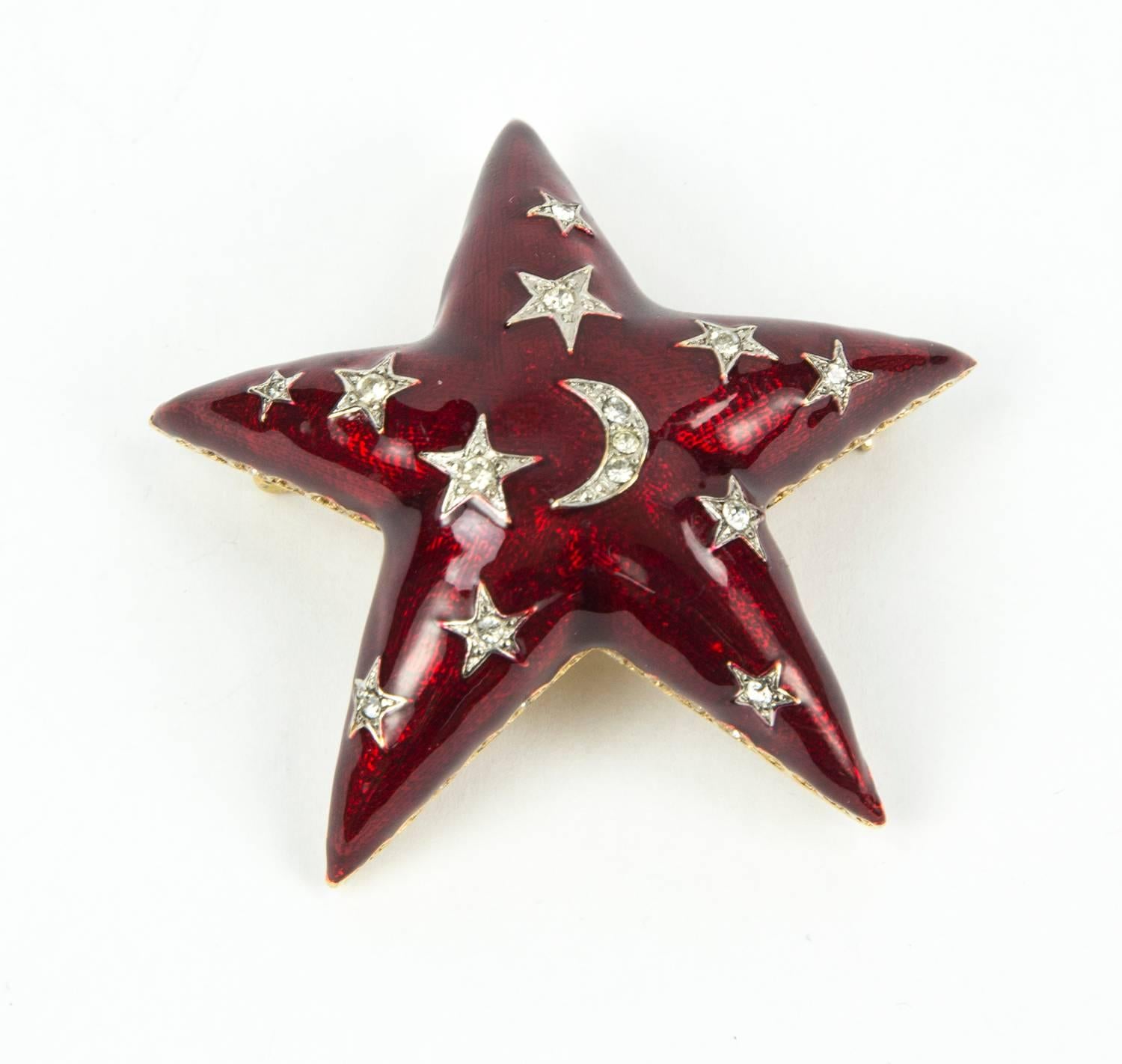 Celestial and Sparkling…These Beautiful Gold tone Butler & Wilson Planet design pins show Rich Red Enamel, set with the brightest Swarovski Rhinestones. Stand out from the crowd. Perfect for dressing up any outfit. Approx. sizes of Saturn 1'' x