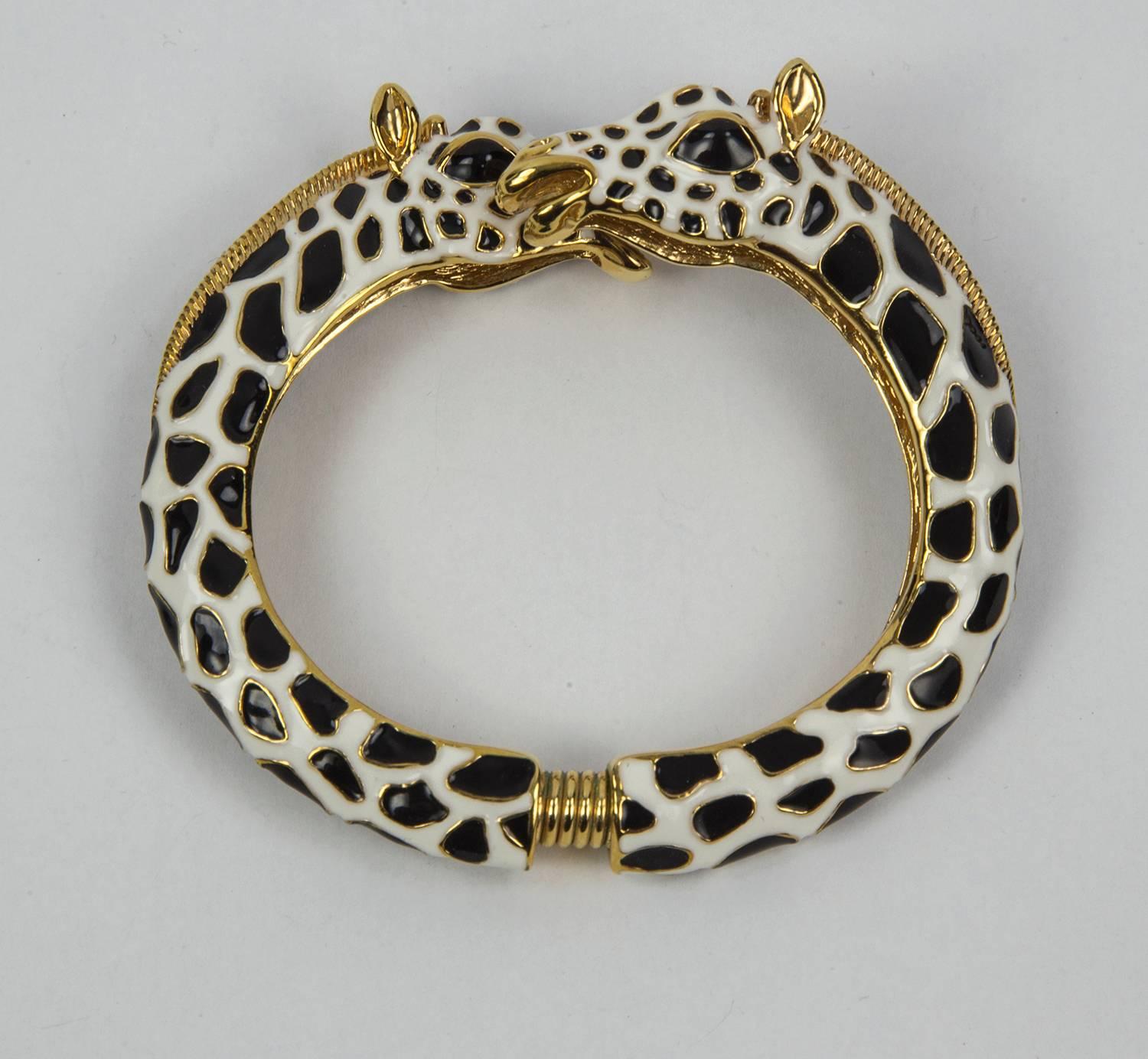 Chic Kenneth J Lane spiral Hinged Bangle Cuff Bracelet depicting two White and Black Enamel Giraffes facing each other and a co-ordinating Ring set with a Beautiful Pink CZ stone; gold tone accents; The bottom spring mechanism allows easy entry and