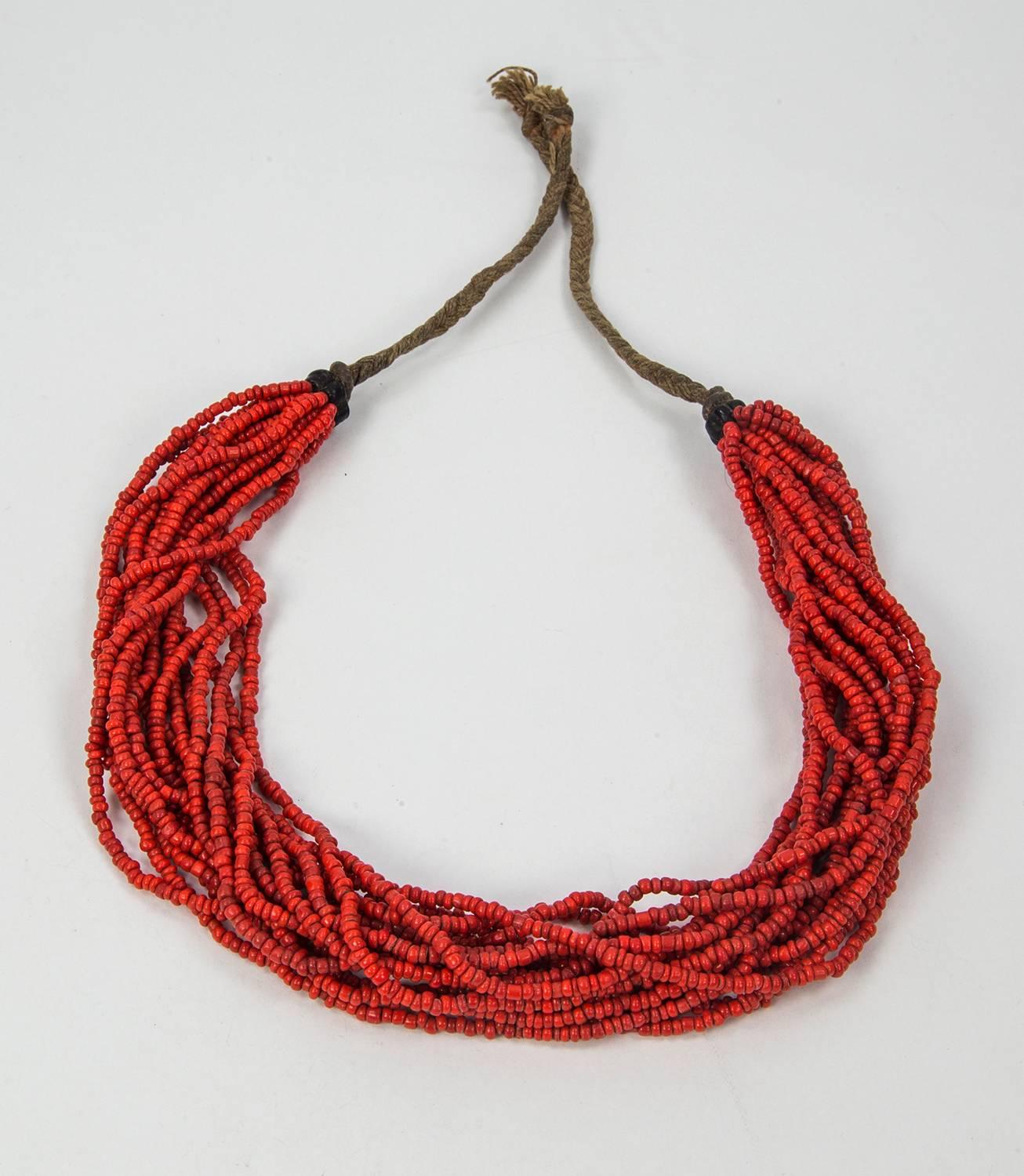 Extraordinary wearable piece of tribal art, 20-Strand Tribal Coral Necklace features 17 twisted rows of small nugget shaped deep red coral beads, measuring approx. 5mm; approx. length of necklace: 16”+; Unique and Fabulous as you are! 
