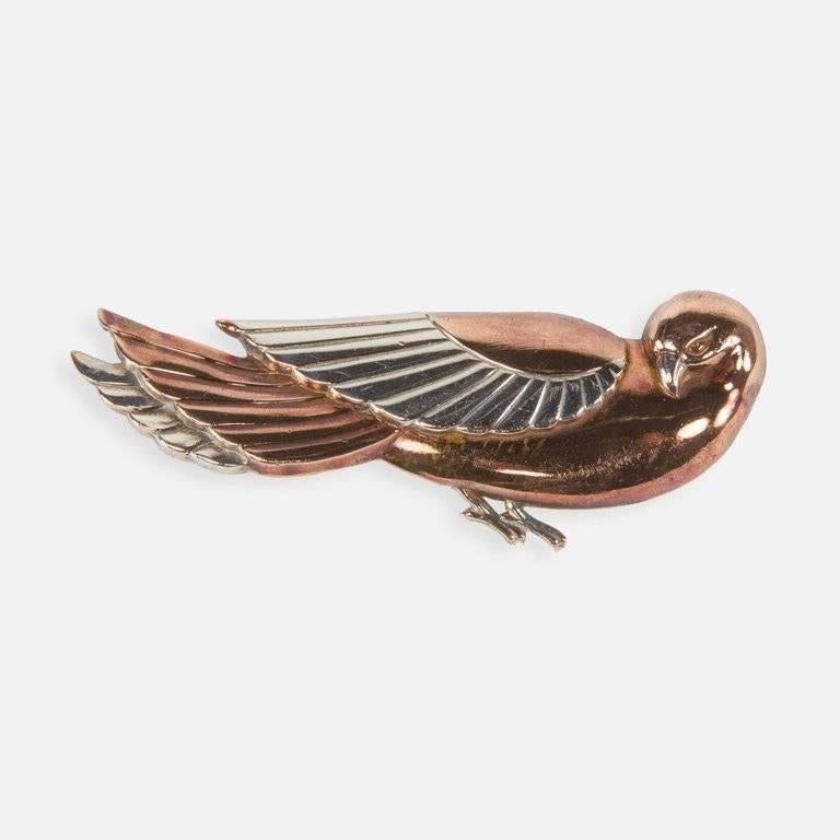 Dynamic Art Deco Copper and Silver Dove Bird Pin, measuring an impressive 3.5” long; C1930s. For the Fashionably fearless, providing a rare blend of Elegance and Edge! 
