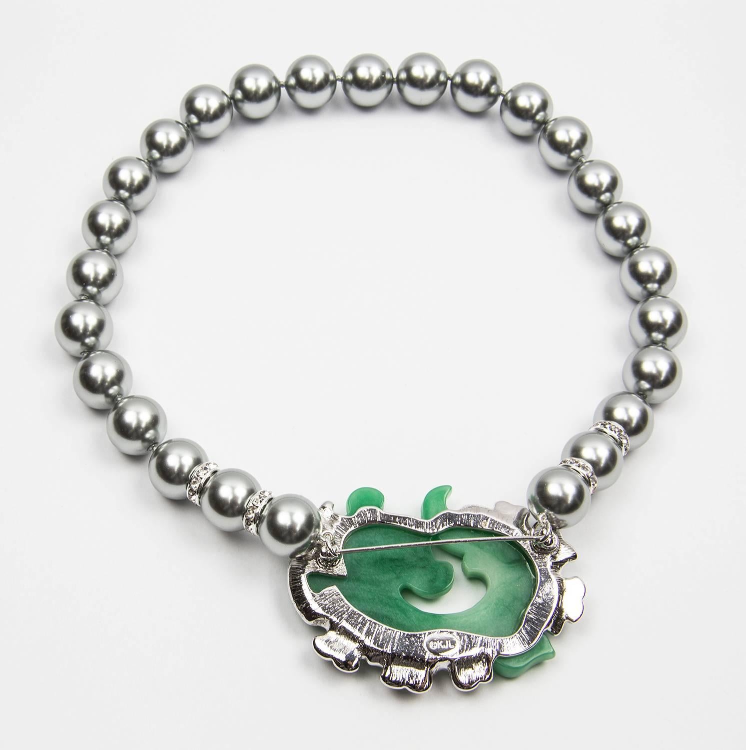 Divine Kenneth J Lane Etched Oriental Faux Jade Dragon and Luminous Faux Silver Tahitian Pearls, Brooch Pendant Necklace. Approx. length of necklace: 15”. Fish Dragon design Brooch marked: KJL; body of the dragon is faux jade, eye set with a