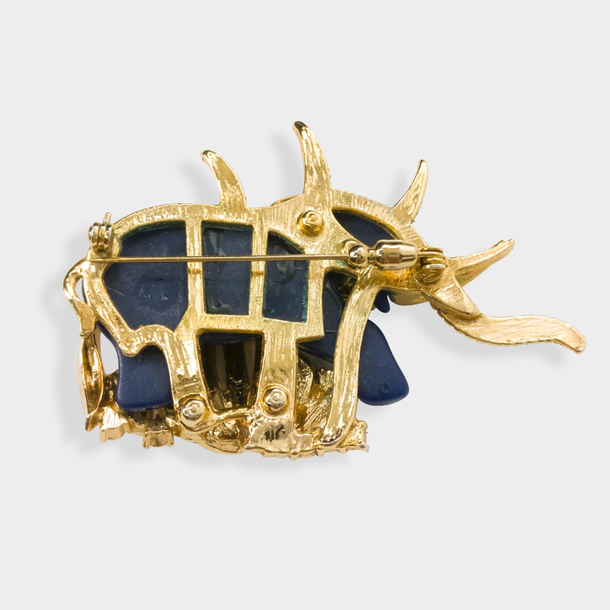 Featuring a Stunning Vintage Brooch of an Elephant in the Grass, surrounded by sparkling CZ; by famed High End Designer Hattie Carnegie; approx. 3