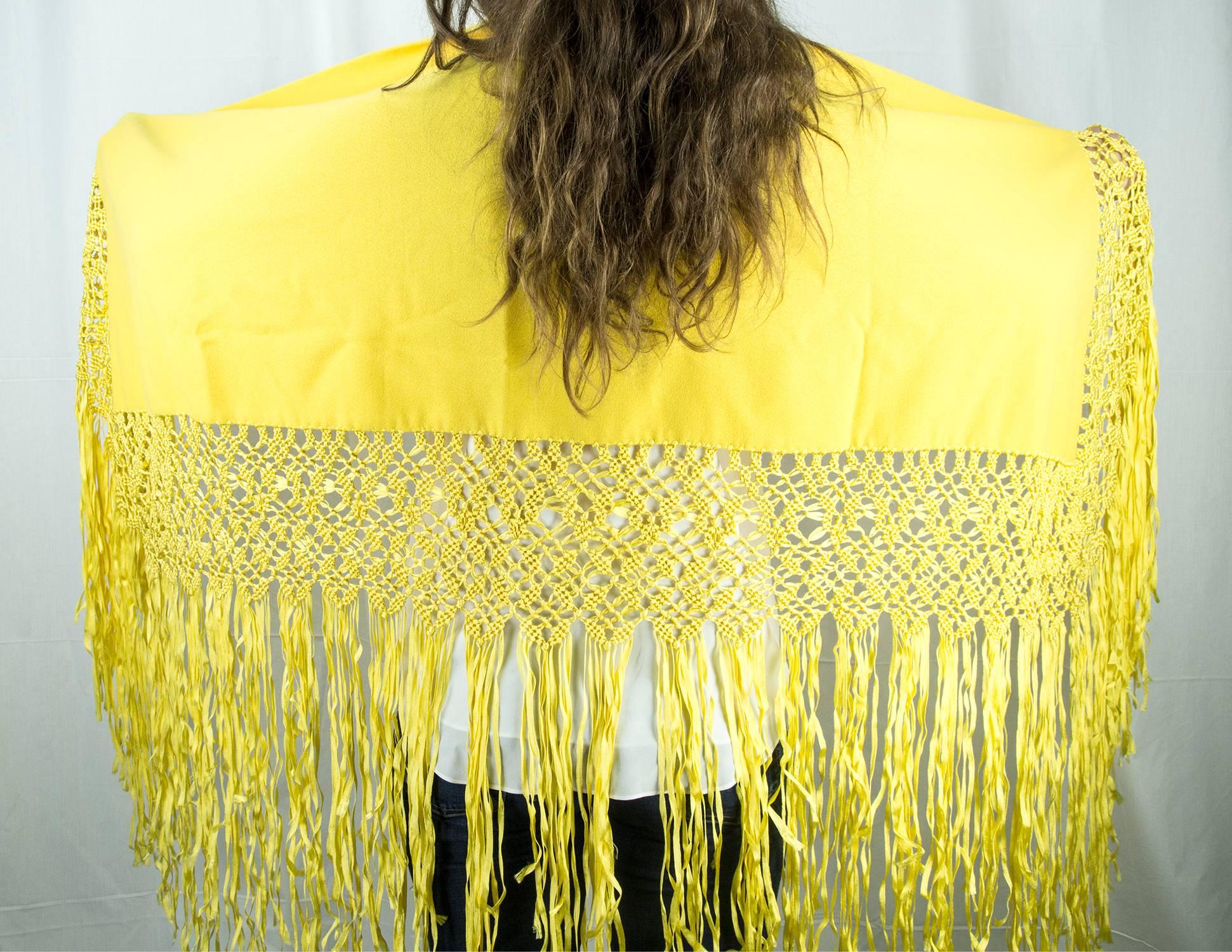 Beautiful woven Wool Fringe Shawl; Spectacular Hand knotted handmade silk fringe adorns the entire length of the shawl; approx. size of shawl:  55” x 18.75” fringe measures approx. 24” long. Chic and Timeless… Illuminating your Look with a touch of