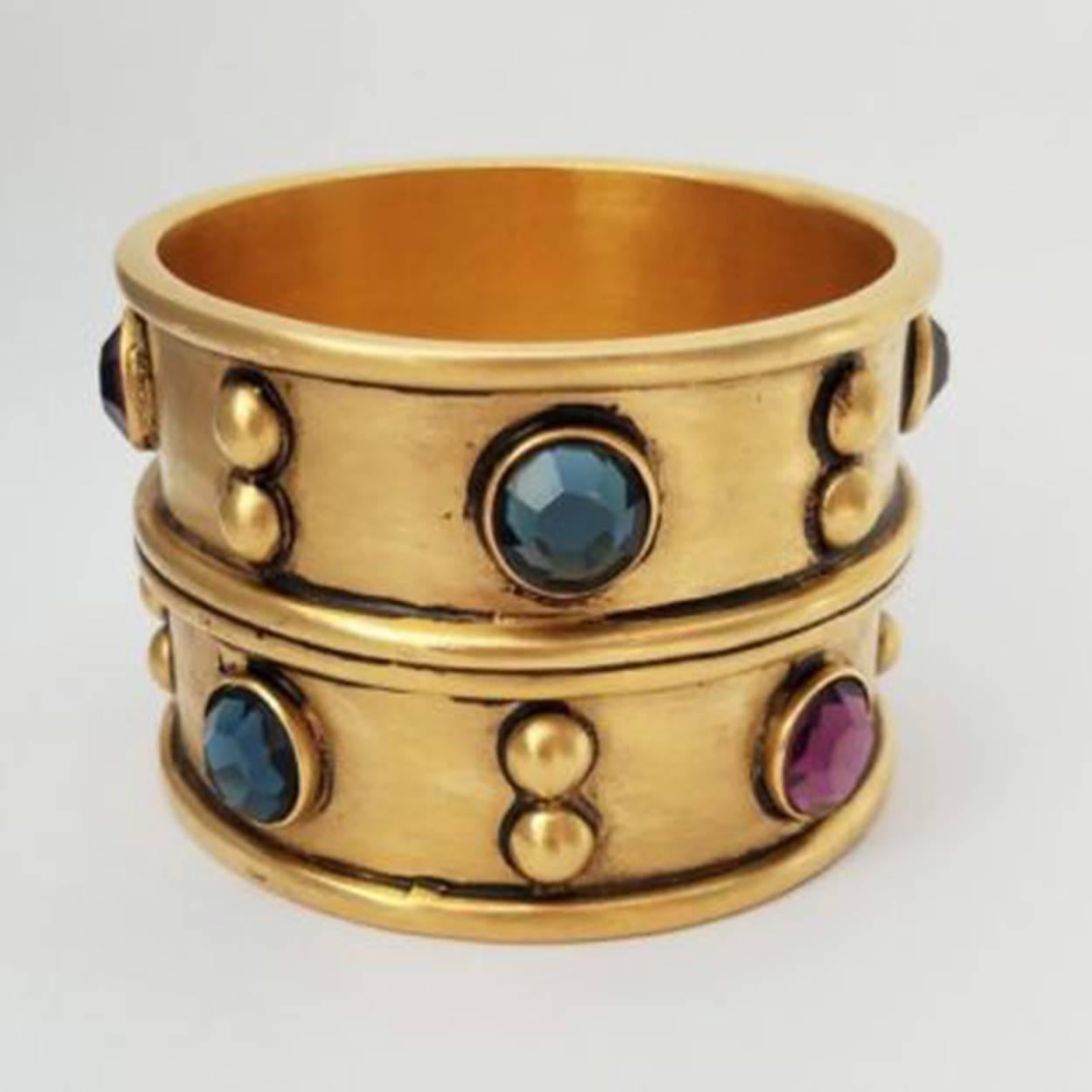 Sensational wide bangle cuff Jeweled bracelet set with purple and blue faceted crystals Signed: Ben-Amun. Approx measurements: 1.88