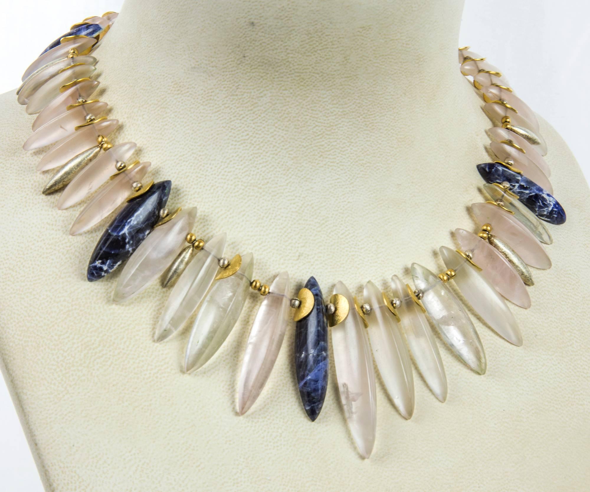 Awesome Crystal Quartz and Sodalite Spear Necklace inter-spaced with gilt sterling silver and sterling silver spacers, held by a gilt sterling silver clasp; approx., necklace length 17.5” An Exciting and Classic Fashion Statement! 

