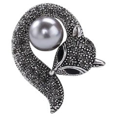 Sparkling Crystal Silver Fox enveloping a Faux Pearl Brooch Pin