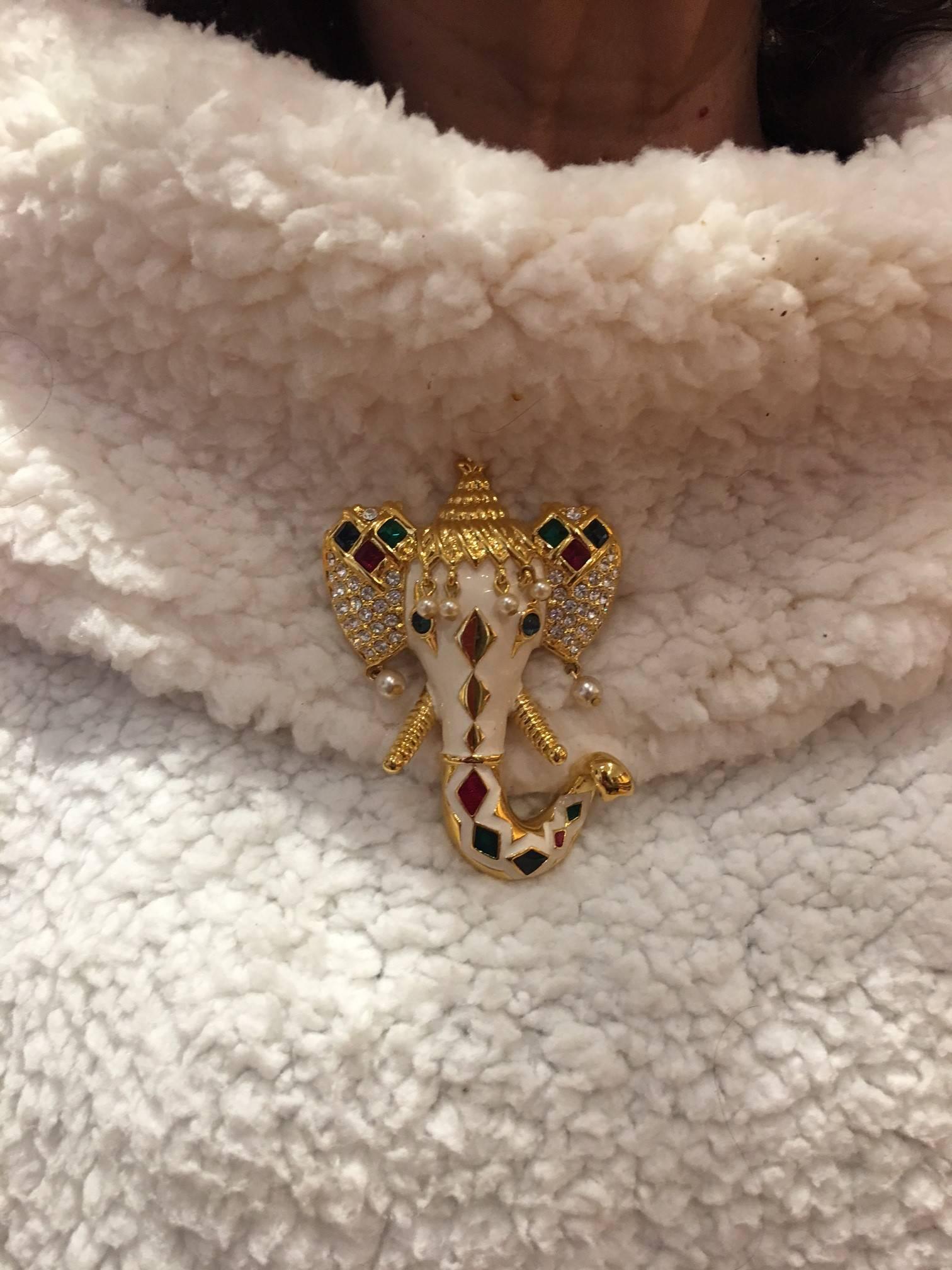 Fabulous Elephant head, all dressed up for ceremony, in cream enamel, Ruby red, Emerald green and Sapphire blue colored Enamel, square and cabochon faux Jewels, Rhinestones and gold tone accent, finished with dripping faux pearls; measuring approx.