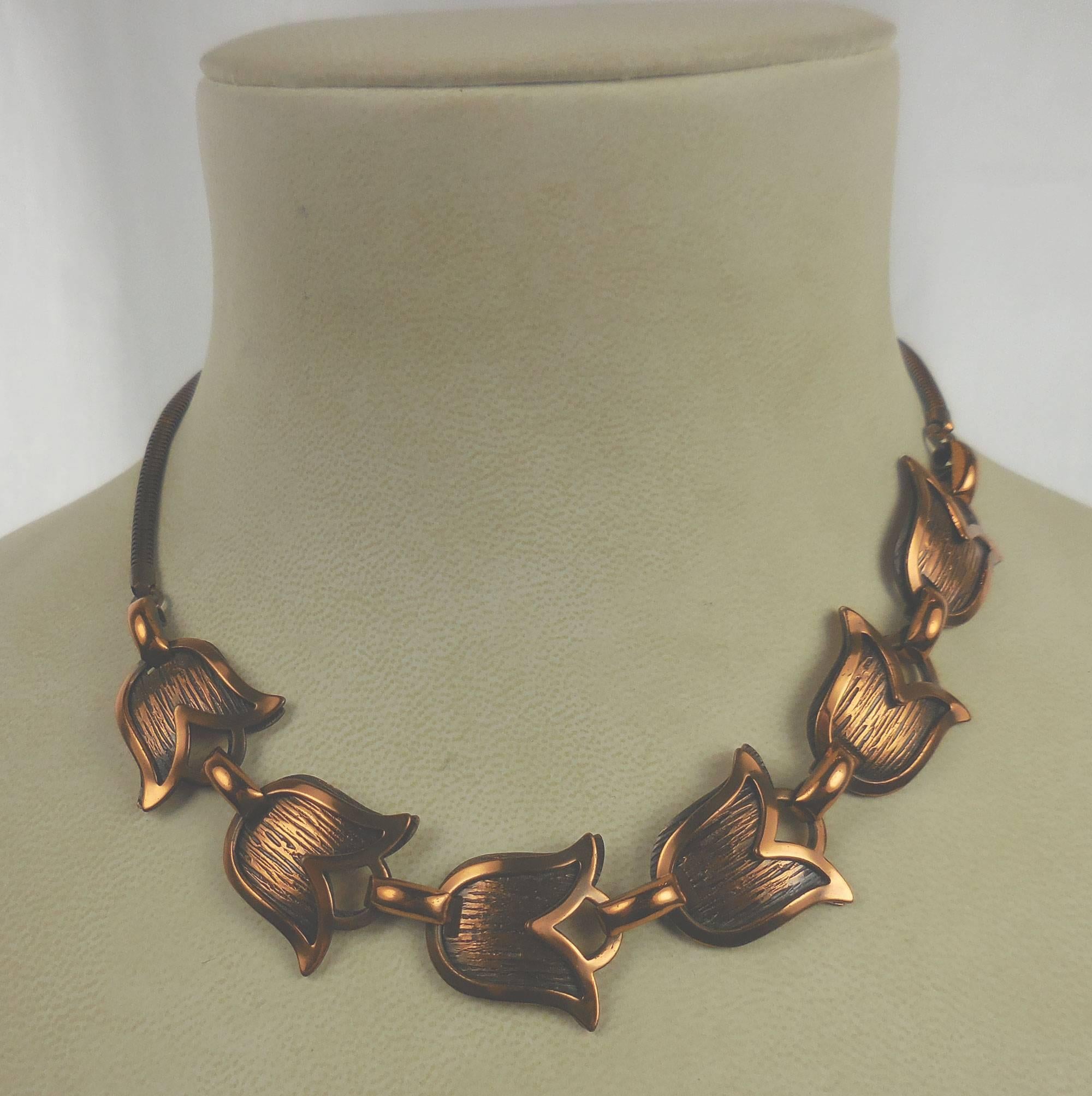 Modernist Copper necklace featuring double layer tulips linked to adjustable length snake chain, by famed mid-century Dominican-Manhattan jeweler, Francisco Rebajes.  