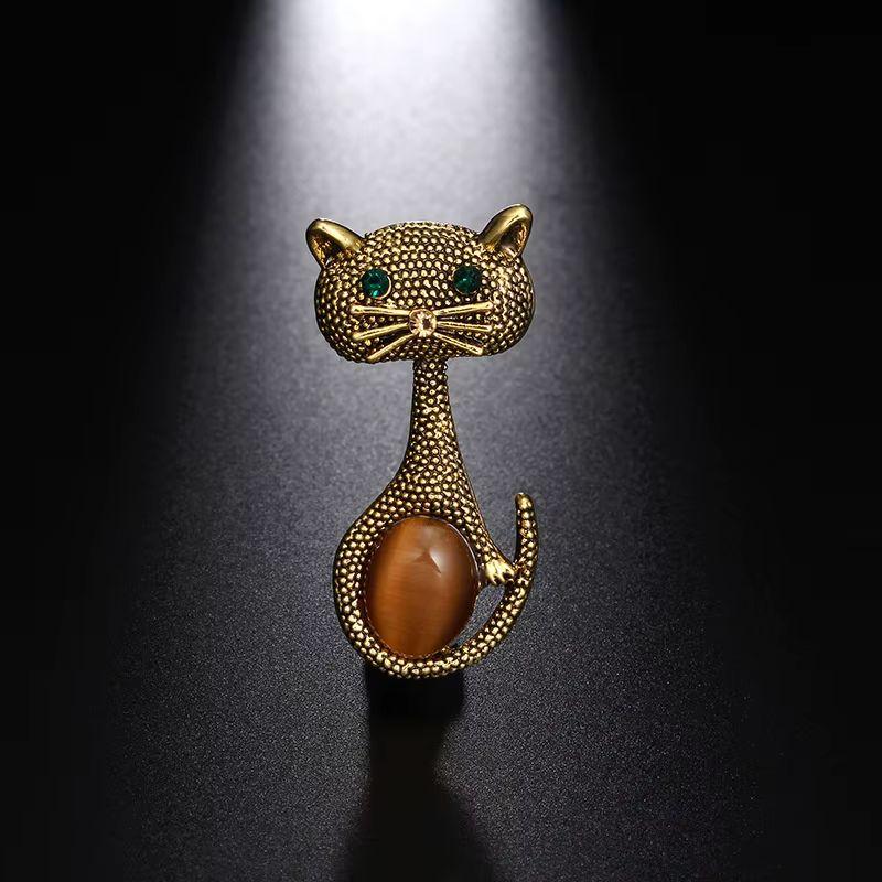 Modernista Gatto d'oro e d'argento Coppia di spille d'epoca in vendita
