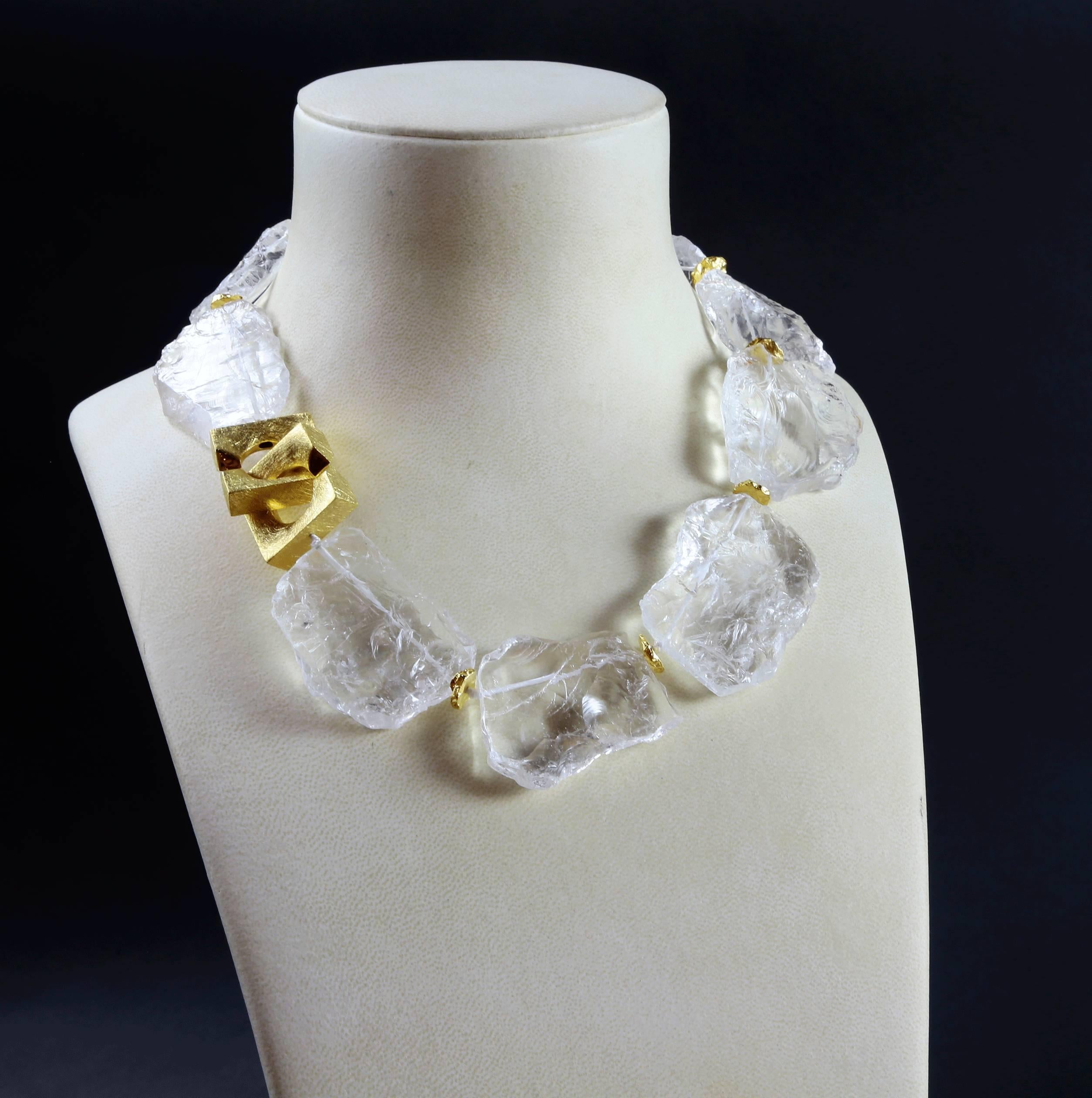 Chunky flat rock crystal necklace enhanced with gold plated sterling silver nugget spacers.The stones are natural on the face, and polished to the reverse, to fall beautifully and comfortably around the neck. The large brushed gold tone clasp worn