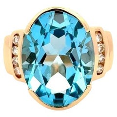 Vintage 11.49 Carat Oval Blue Topaz and Diamond Gold Cocktail Ring