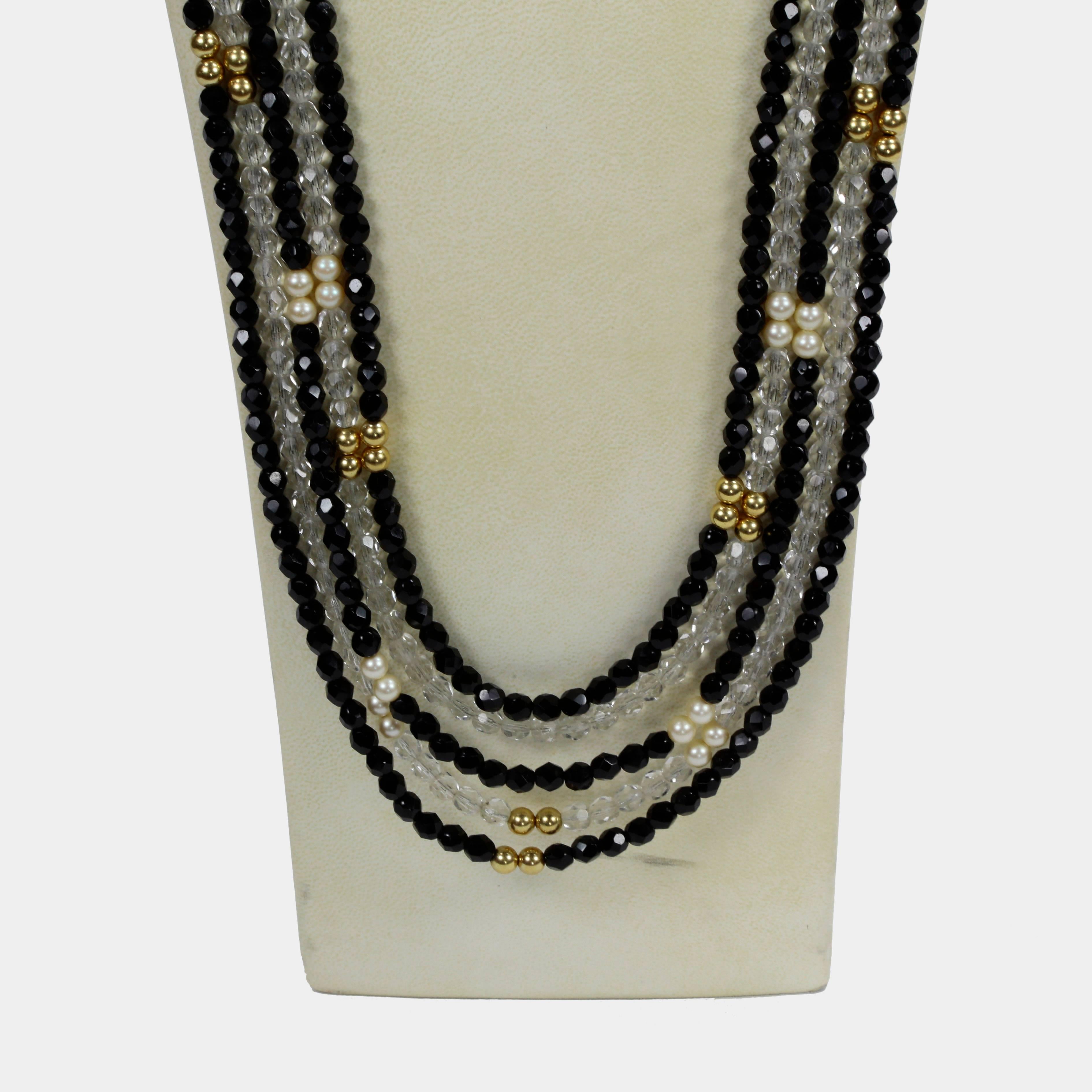 Impressive, yet understated, long eye-catching five strand Chanel inspired Swarovski Crystal beaded Necklace comprising Black, Clear CZ sparkling Czech crystal beads inter-spaced with faux pearl and gold-filled beads. Handmade intricate piece…Unique