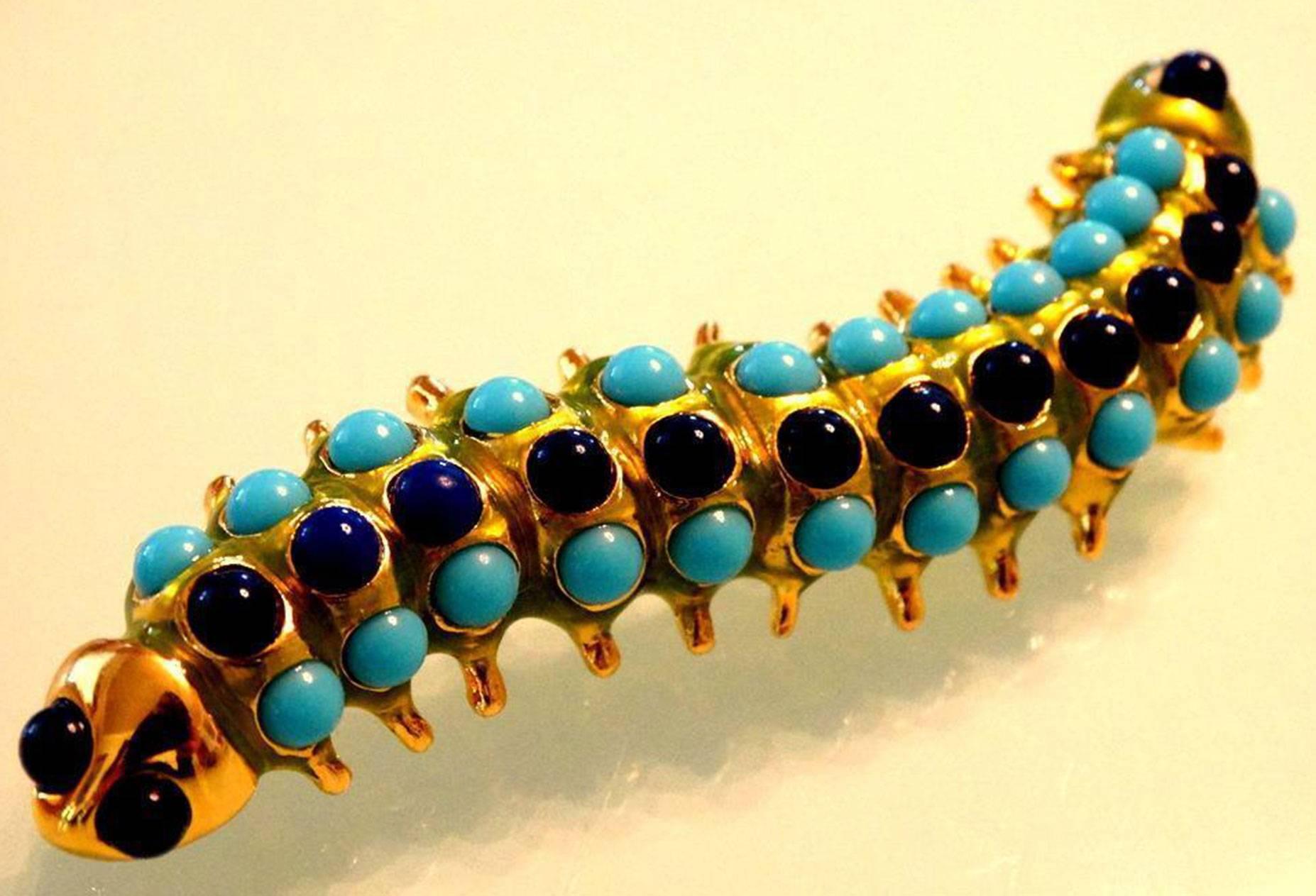 Outstanding Faux Cabochon Lapis Turquoise Caterpillar Brooch Pin; Gold tone mounting; Signed: KENNETH LANE; approx. 3