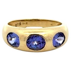 Bague vintage en or sertie de trois tanzanites – Bijoux de collection haut de gamme
