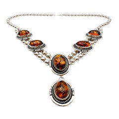 Vintage-Halskette im Stil der amerikanischen Ureinwohner aus Bernstein und Sterlingsilber mit Navajo-Motiv „Squash Blossom“