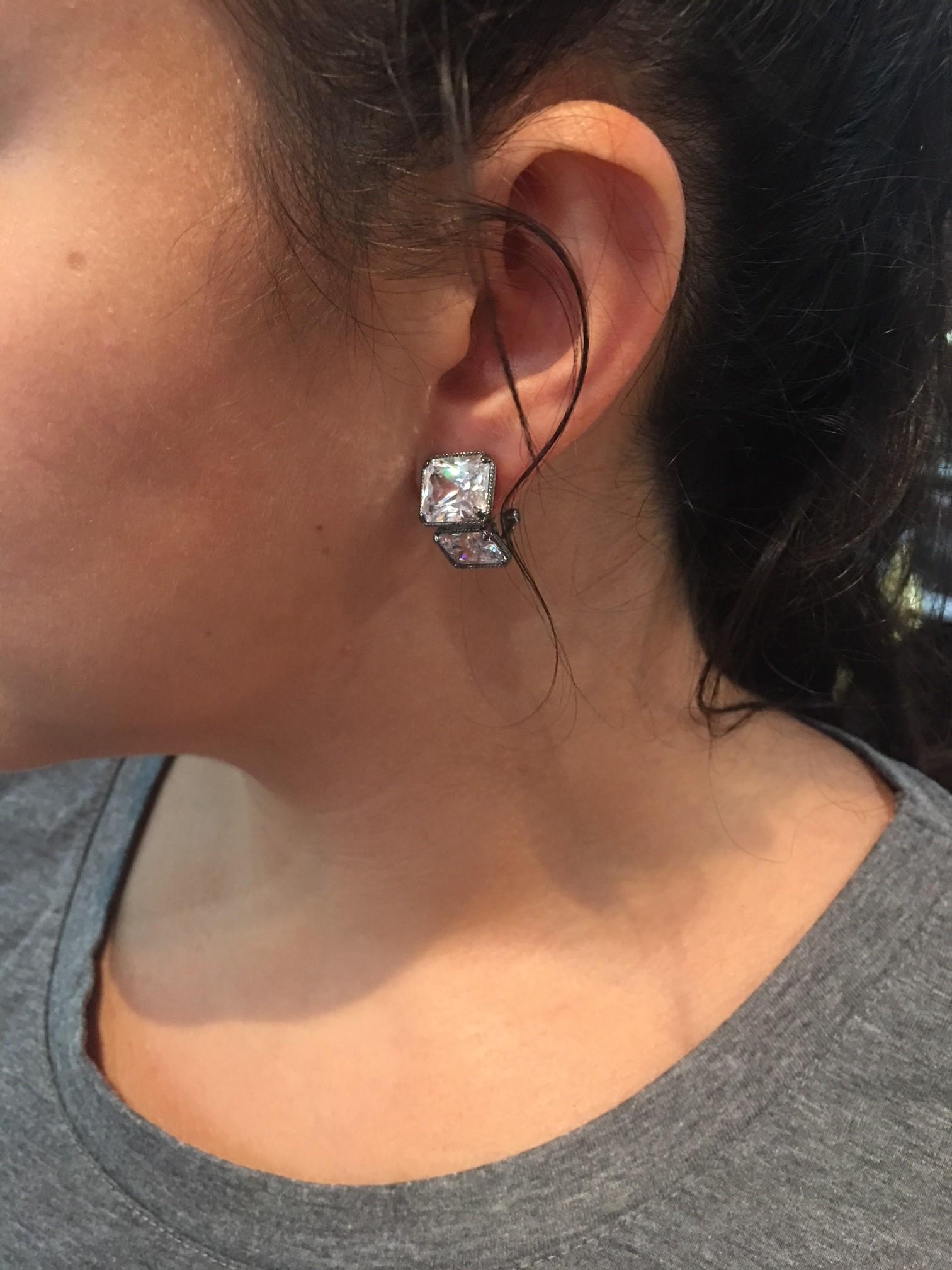 Simply Beautiful…each earring is set with one large 13.5mm x 11.5mm and one 11.5mm x 8.0 mm cushion shape faux Diamond, making a striking statement! All hand set in Sterling Silver. Approx. total length .75