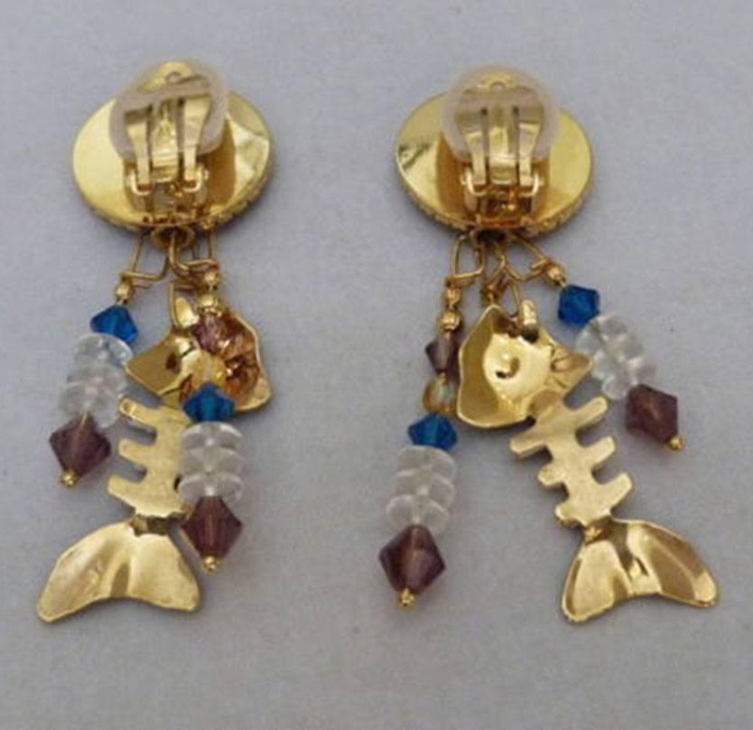 Whimsical Lunch at the Ritz Cajun Catfish Dangle Earrings featuring enamel and Faux Diamond skeleton fish with original comfort pads clip earrings on original MADE in USA Menu card.  Detailed designer figural beauties! Approx. 2.63 inches x .88