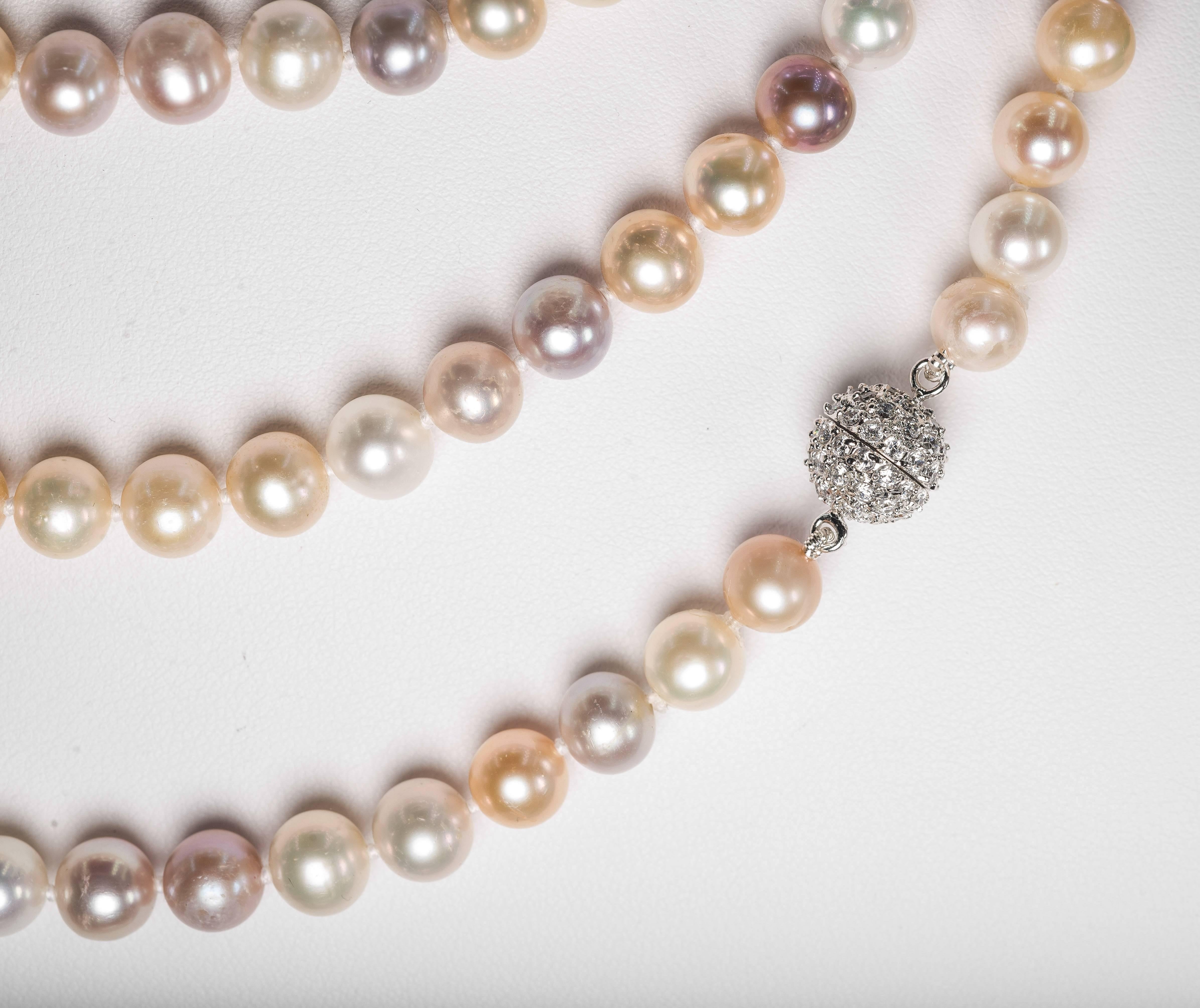 Modern Elegant Sixty Inch Long Rope of Multi-shaded Freshwater Pearls