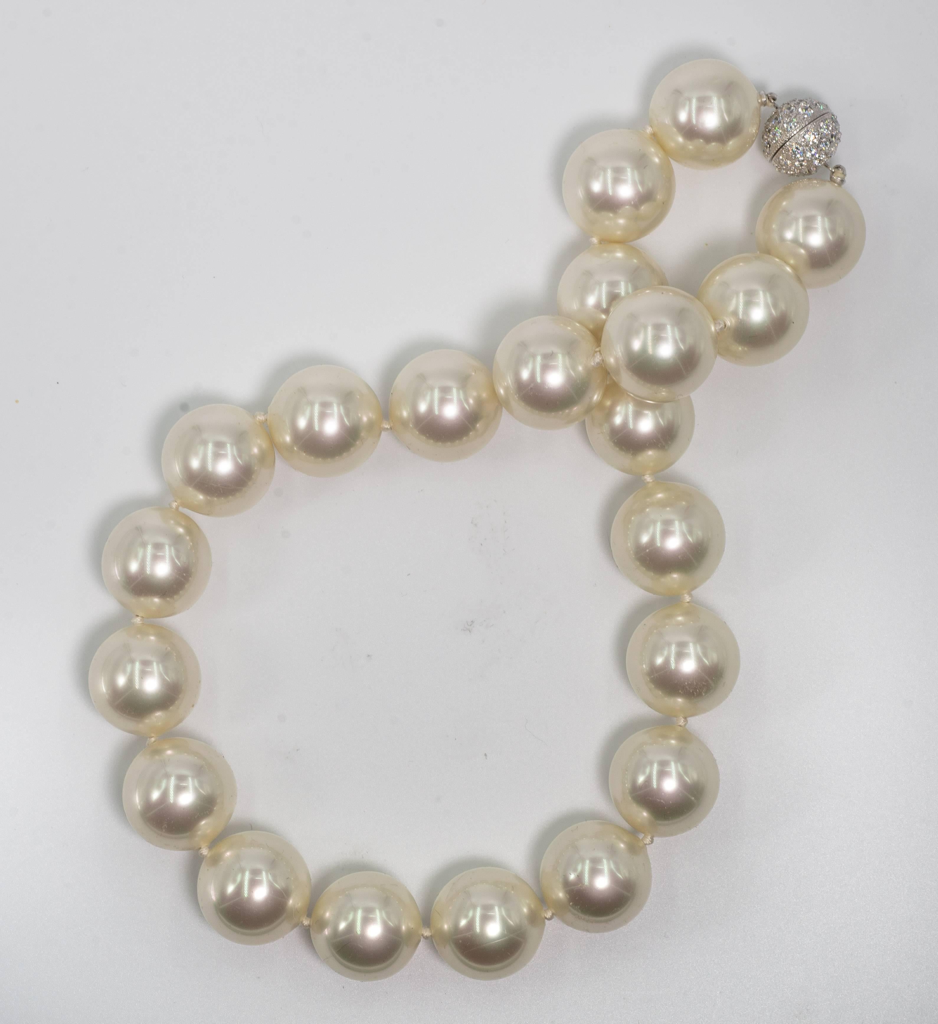 Theresa May Style stunning 20inch faux 20mm French White South Sea Color  handmade pearls by France's oldest faux pearl makers dating back to Napoleon lll. .The pearls are hand strung and knotted to a wonderful pave cubic zircon sterling clasp.