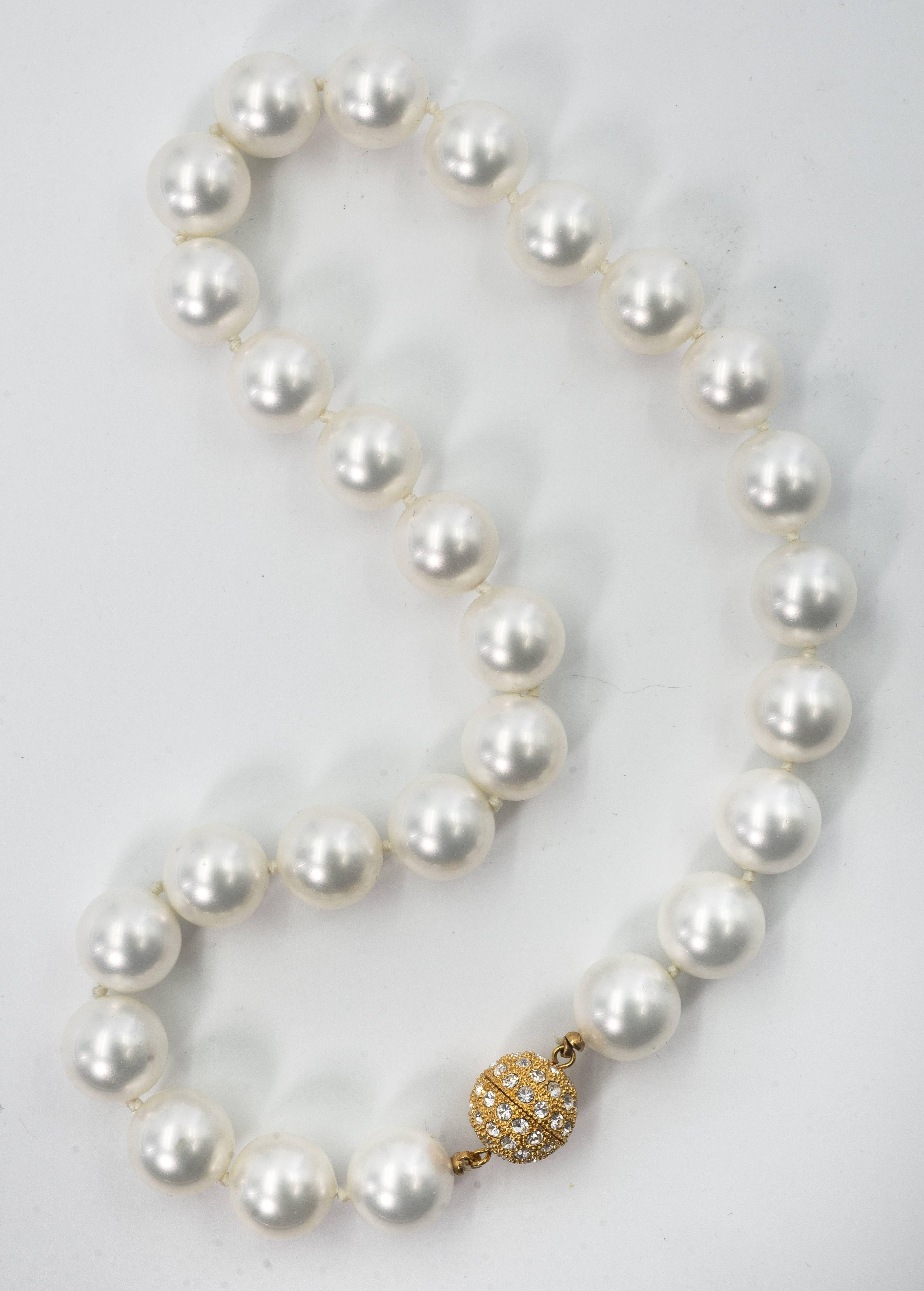 Wonderful delicate white shade of handmade lustrous Japanese faux pearls beautifully  strung 14mm 17'' long with pave Cub Zircon screw ball clasp.