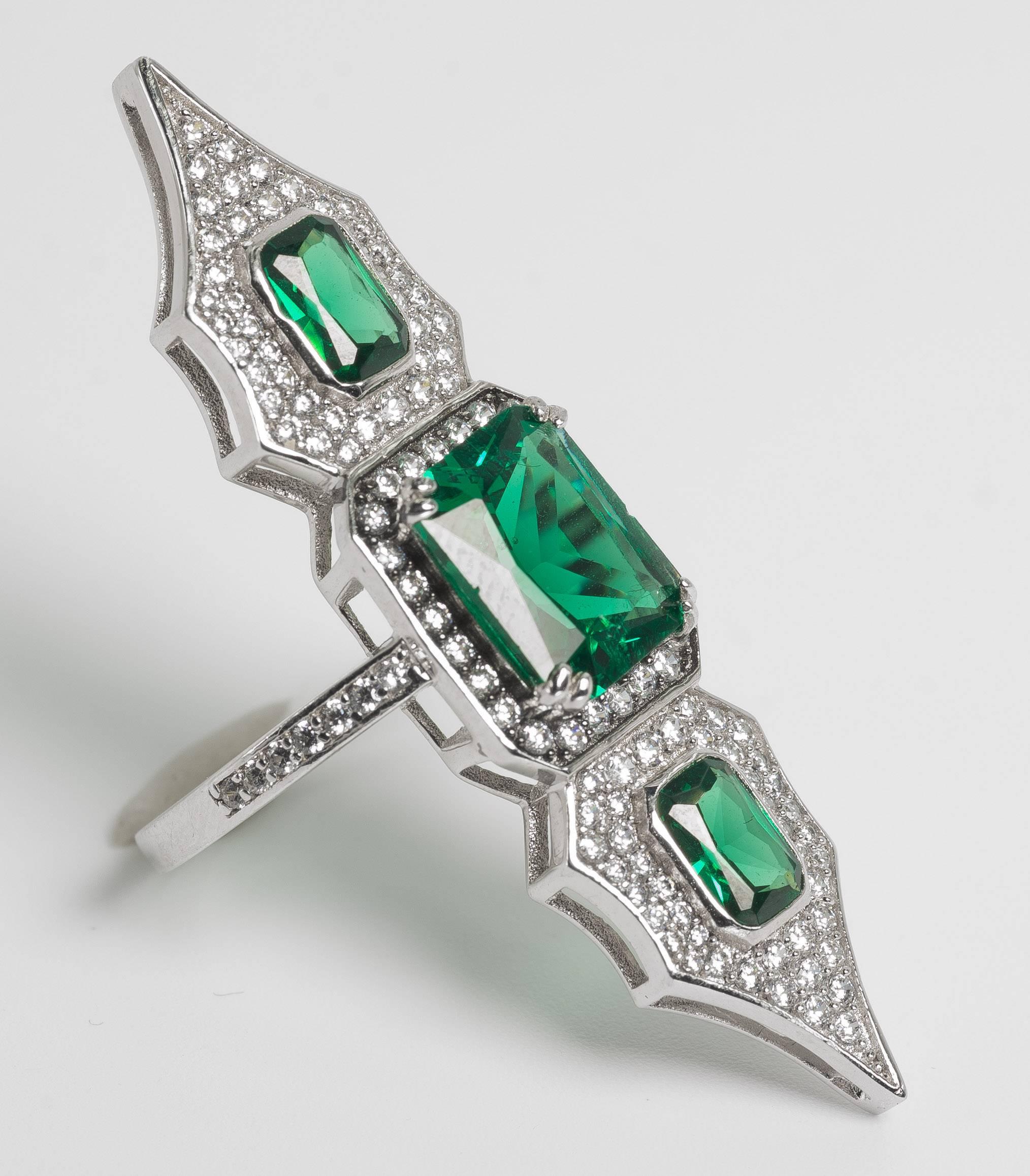 Elegant feminine faux diamond emerald arabesque sterling ring measures 2inches down the finger and 1/2inch wide. Sizing is free.