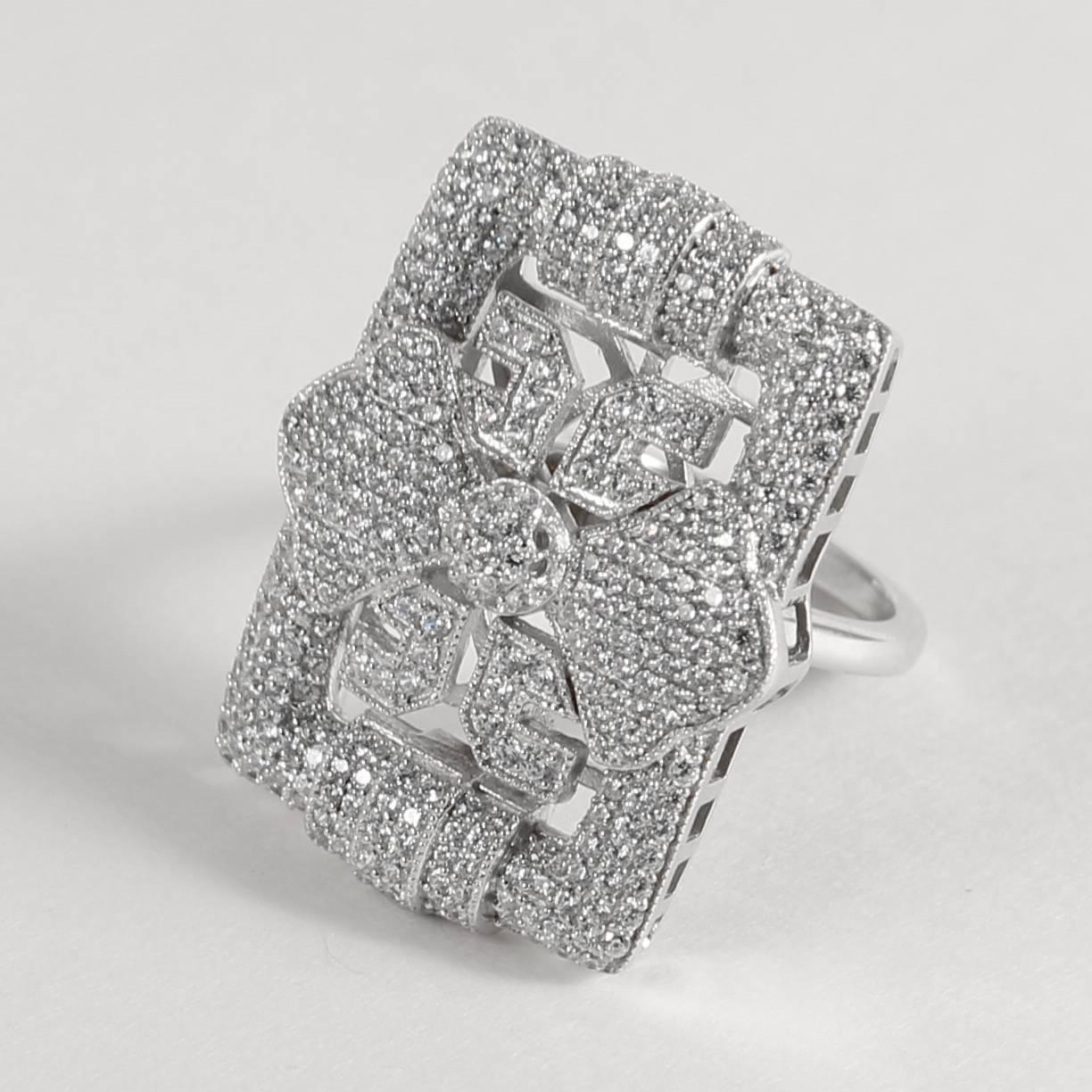 Elegant Art Deco style pave sterling cocktail ring measures 1 1/4 inches by 1 inch wide pave set cubic zircons set in sterling silver. Sizing is free. 