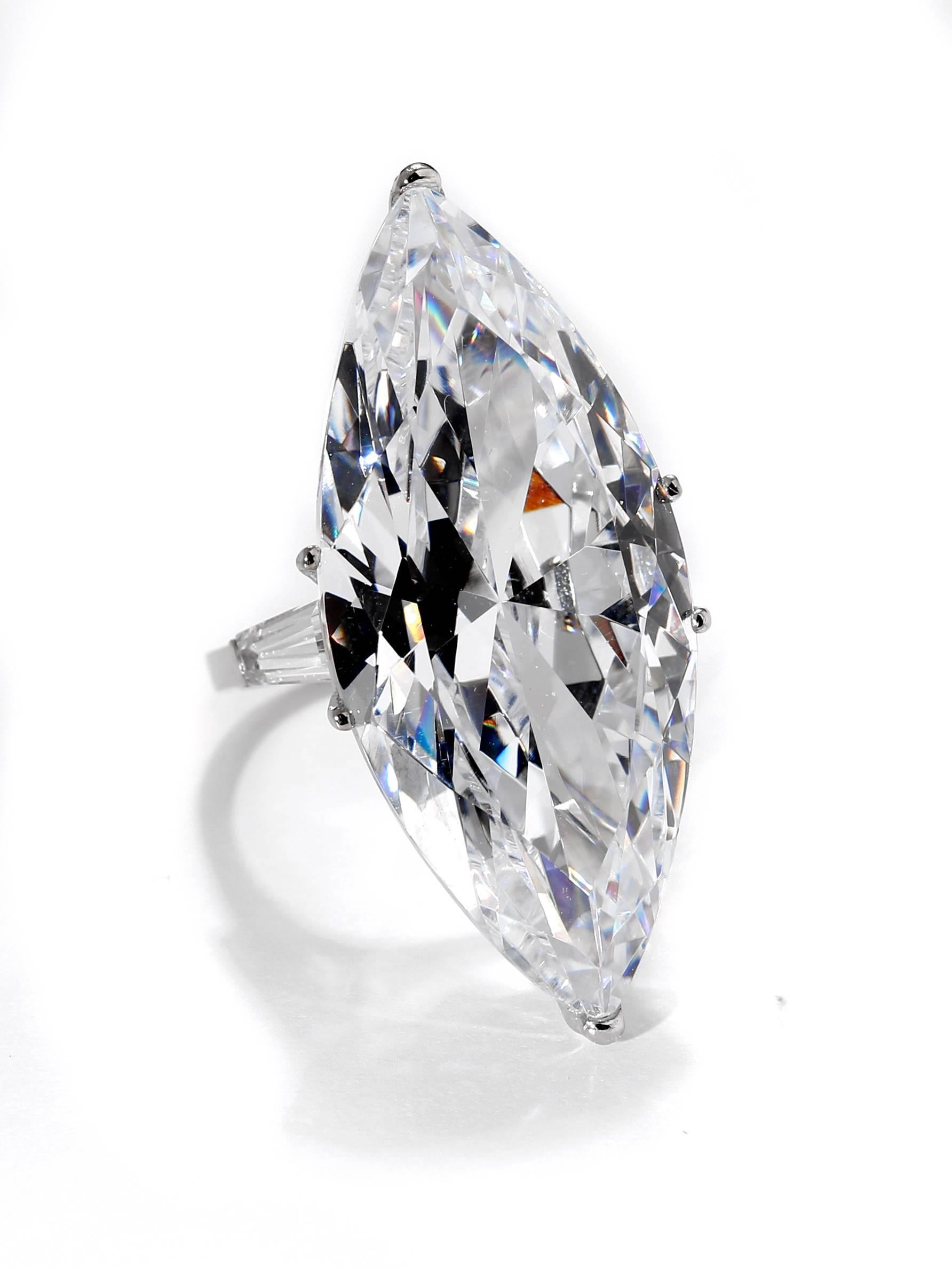 A Fabulous Fake. One for sale here, one sold at Sotheby's by Daniele Steele that had been bought at Bergdorfs in the 1990s. A copy of the Real One made in D Color Flawless cubic zircon hand-cut by a NYC diamond cutter. Sides set with tapered CZ