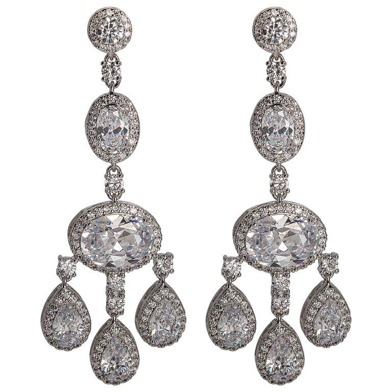 Faux diamond shimmering girandole chandelier earrings made of the finest hand set man-made gems. Totally real looking glamorous faux jewelry, light as a feather, flexible and post fitting measures 3'' long by 1'' wide.