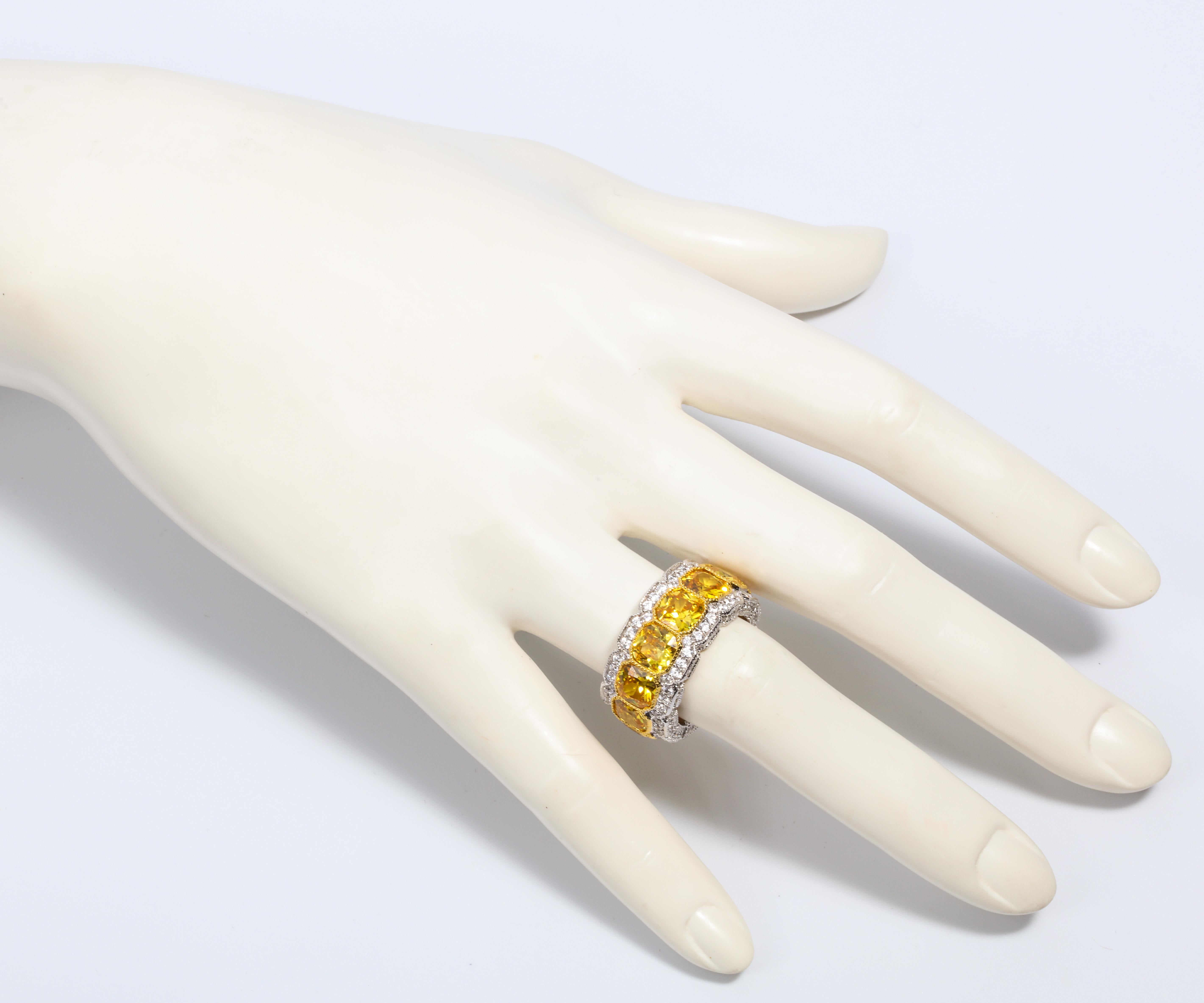 Magnificent Costume Jewelry stunning faux yellow diamond half inch wide band mille-grain set with stones on the side as well all completely pave.  Each colored stone is about one carat look. Size 7,