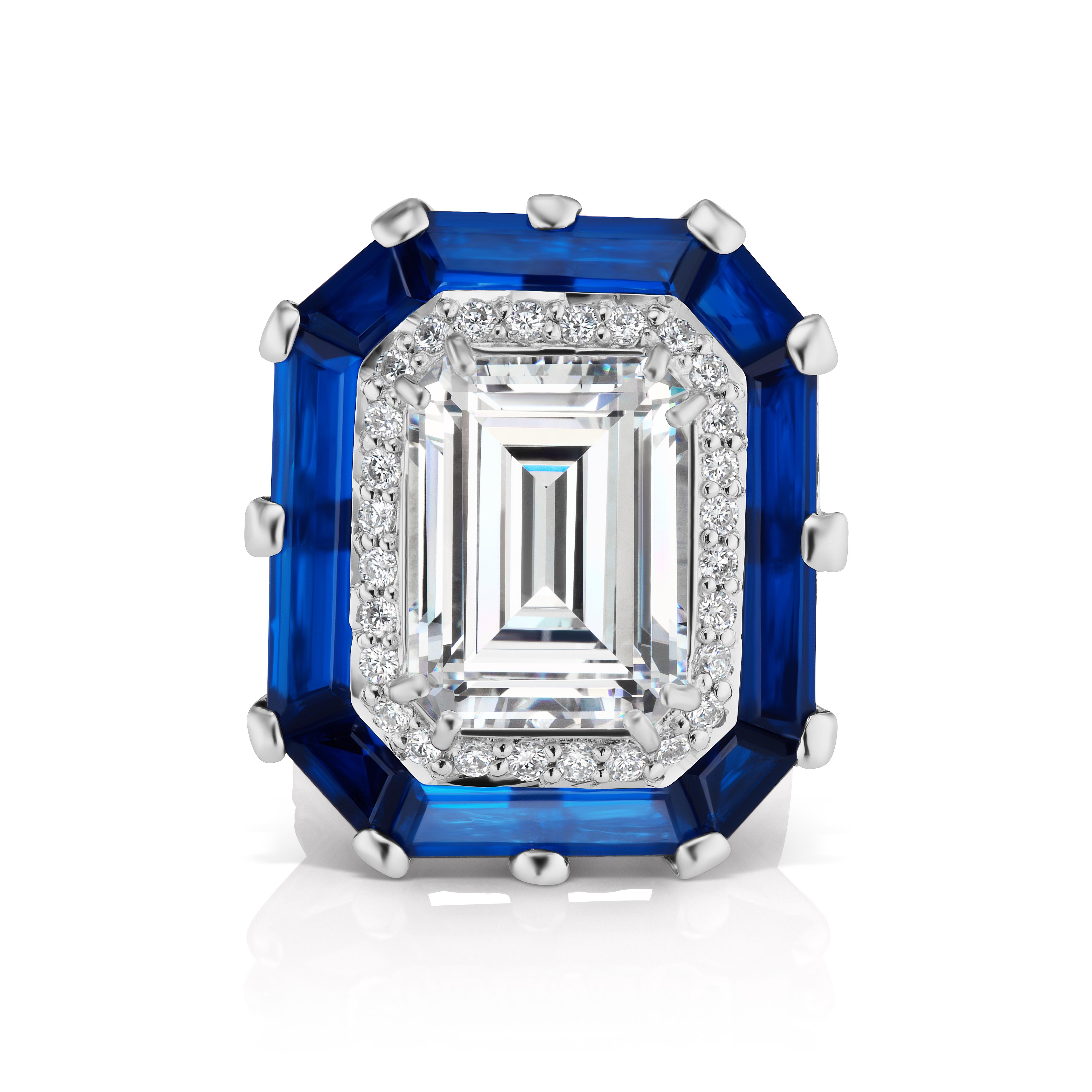 Magnificent Costume Jewelry Art Deco Style Halo Cubic Zirconia 12 Carat Emerald Cut  Diamond Man-Made Sapphire Baguette with Round CZs Set All Around the Shank Sterling Ring. 1 Inch long by 1 Inch wide. Free sizing