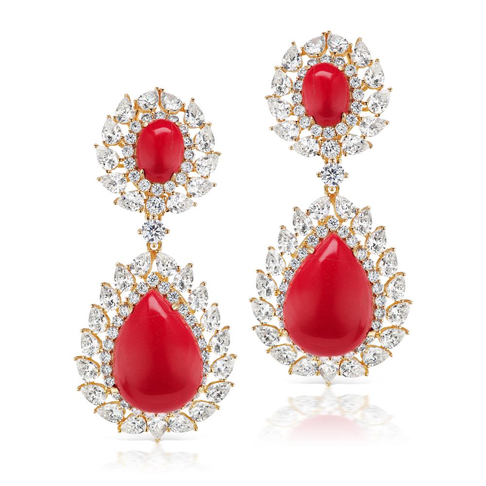 Magnificent Costume Jewelry Coral Diamond Vermeil Sterling Silver Earrings Set With Brilliant Cubic Zirconia and Manmade Coral .
2 inches long by 1 inch wide at base. Clip/post
