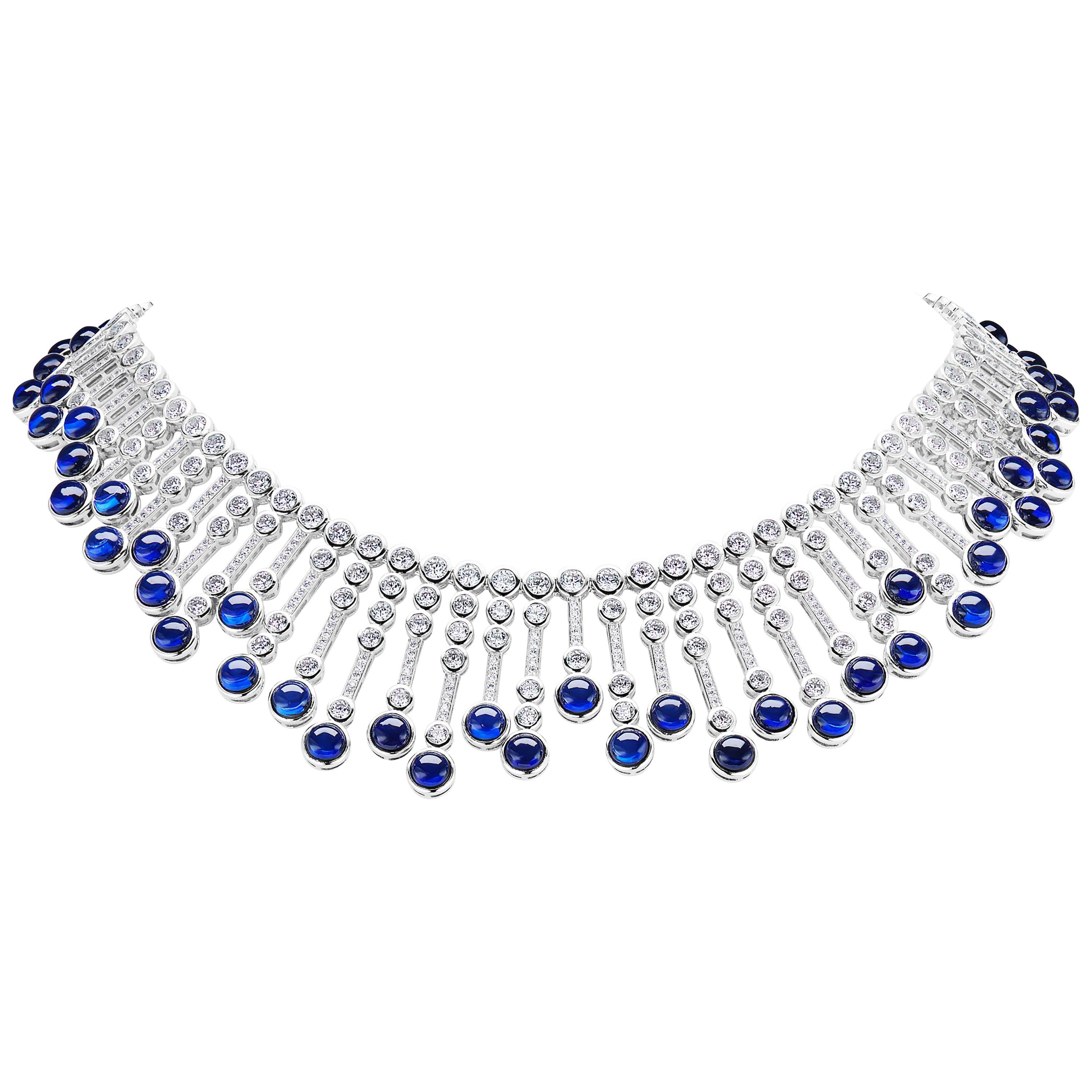 Magnificent Costume Jewelry Man-Made Cabochon Sapphire Diamond Fringe Flexible Sterling Silver Necklace of Alternating Gem Tipped Cubic Zirconia Set Bars Suspended from a Double Row Bezel CZ Set Sterling Silver Flexible Necklace measures 16 Inches.