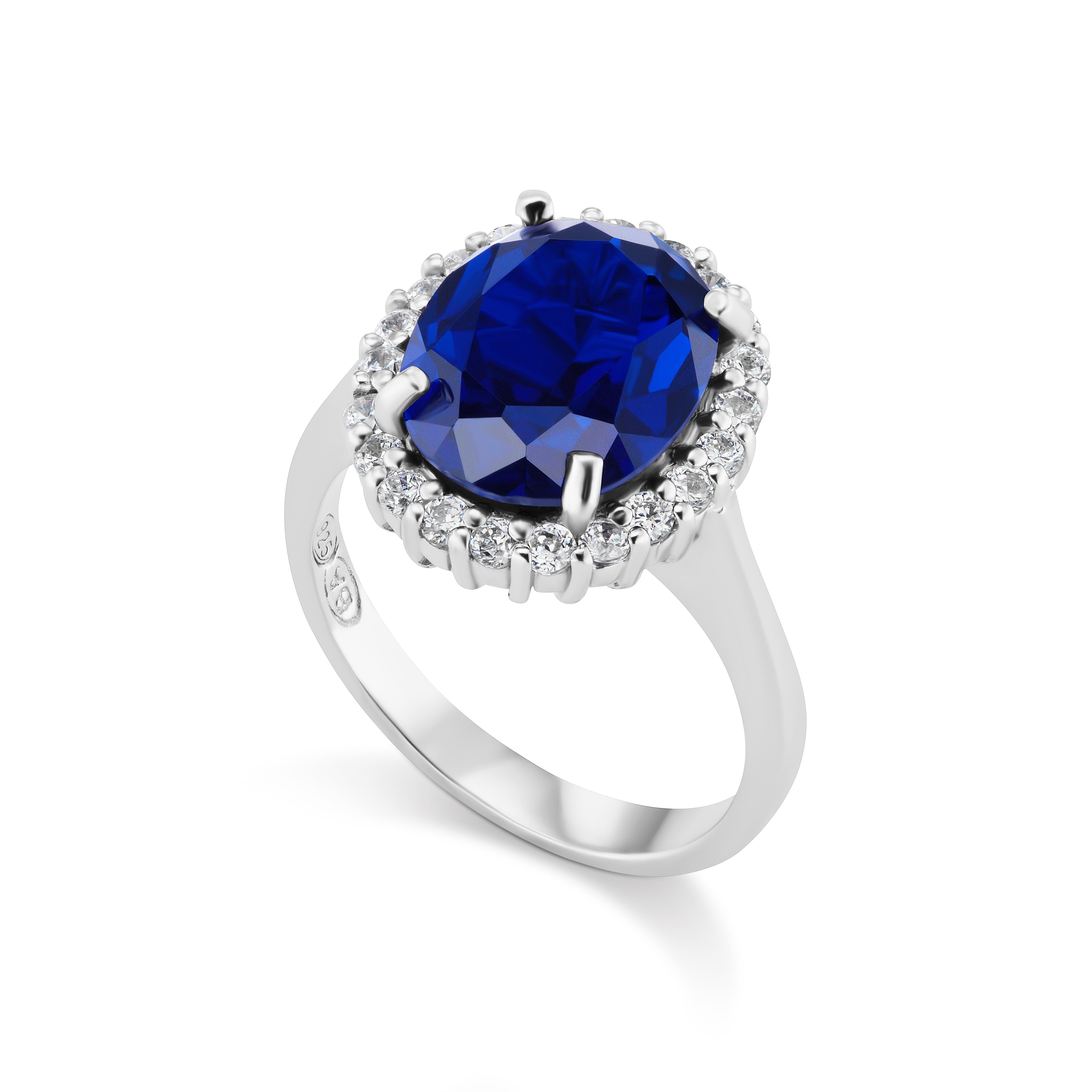 Magnificent Costume Jewelry Mini Princess Diana Man-Made 4 Carat Oval Wonderful Color Sapphire Cubic Zirconia Diamond Sterling Ring measures 1/2 inch diameter, free sizing
