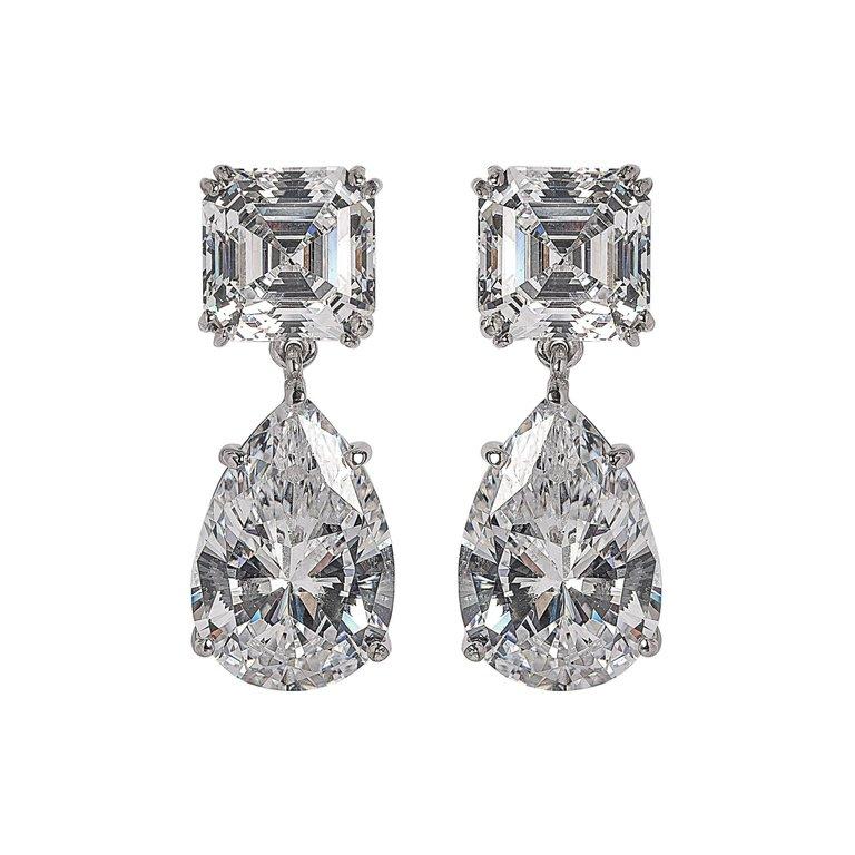 Perfect faux diamond drop earrings made with diamond cut cubic zircons set in sterling best quality ever. The top square stones are 4 carat diamond size and the pear drop are 6 carat size. Post fittings. 11/4'' long. Bright sparkly best