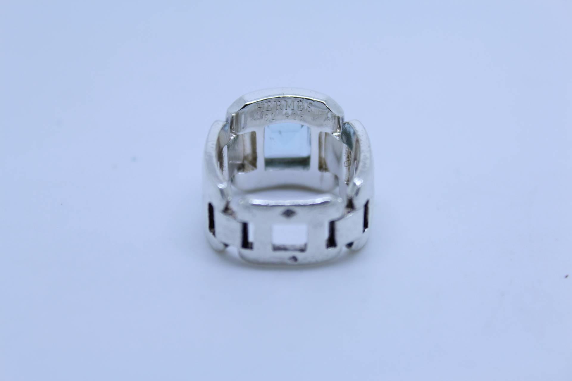 Hermes Silver ring with aquamarine S.52.

Some scratches due to its age.

Stone in good condition
