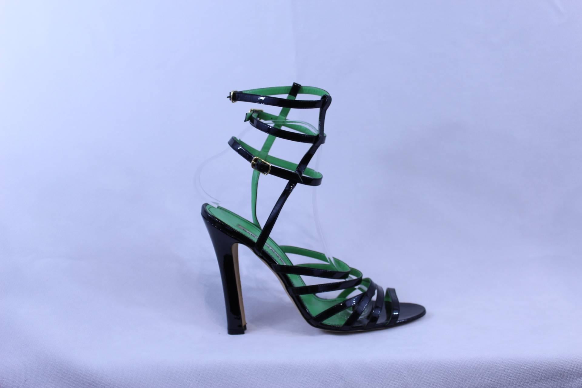 Gorgeous and so stylish black and green Manolo Blahnik's sandals. Size 40 and a half

really good condition.