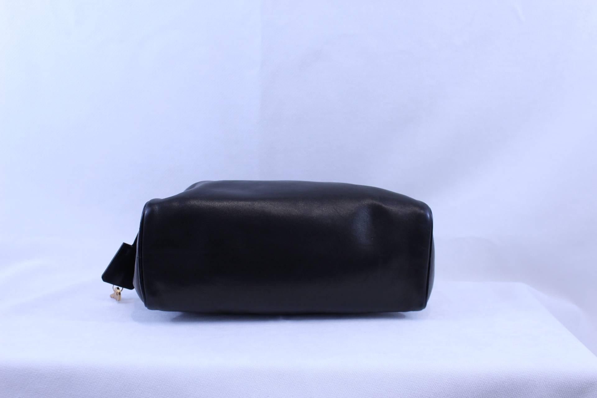 Black Prada black leather bag with brass hardware