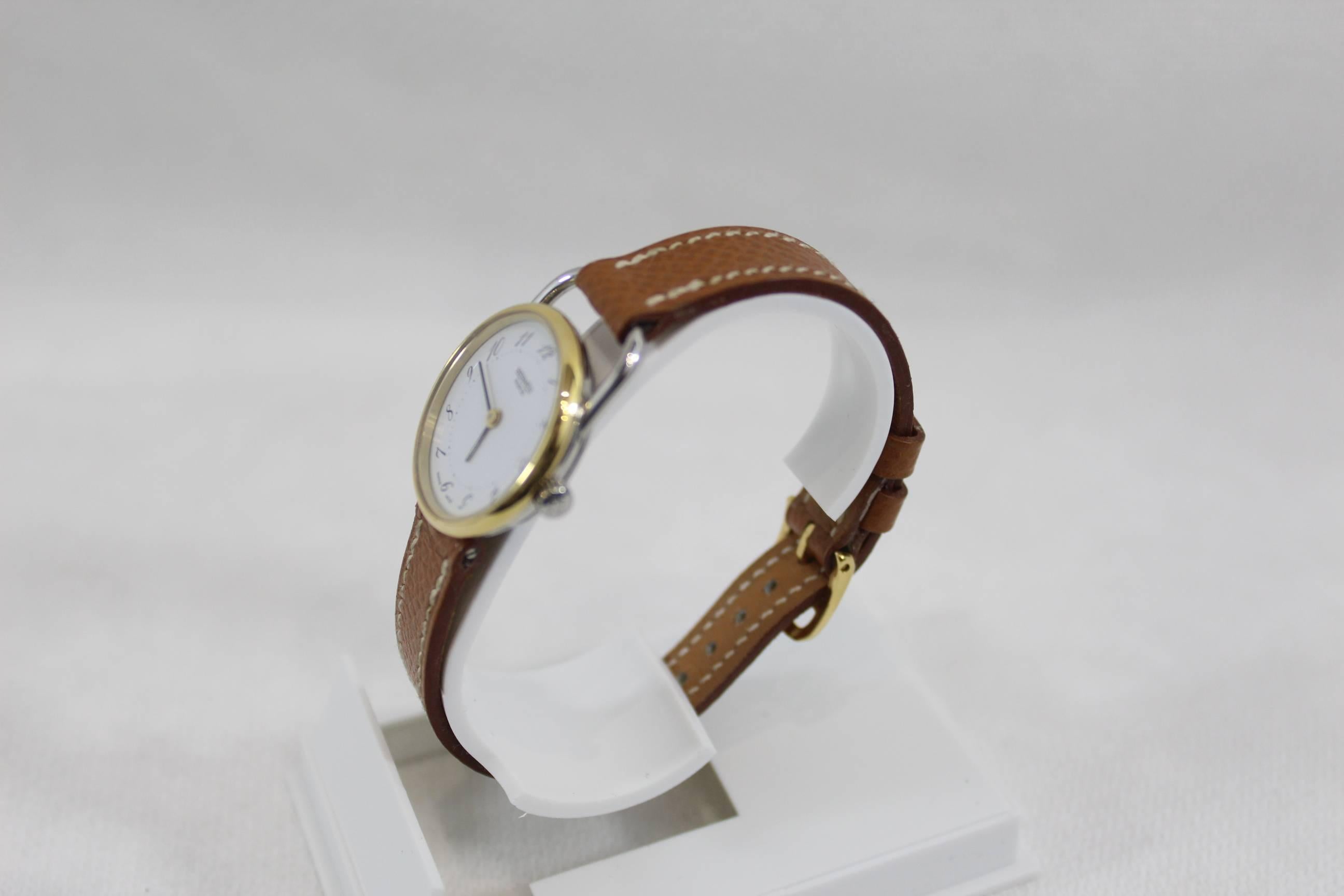 Gorgeous Hermes Arceau Gold plated and Steel watch.

brown leather strap in Epson Leather.

excellent condition. It has been revised by hermes in 2015 so it is still under warranty till june 2017.
