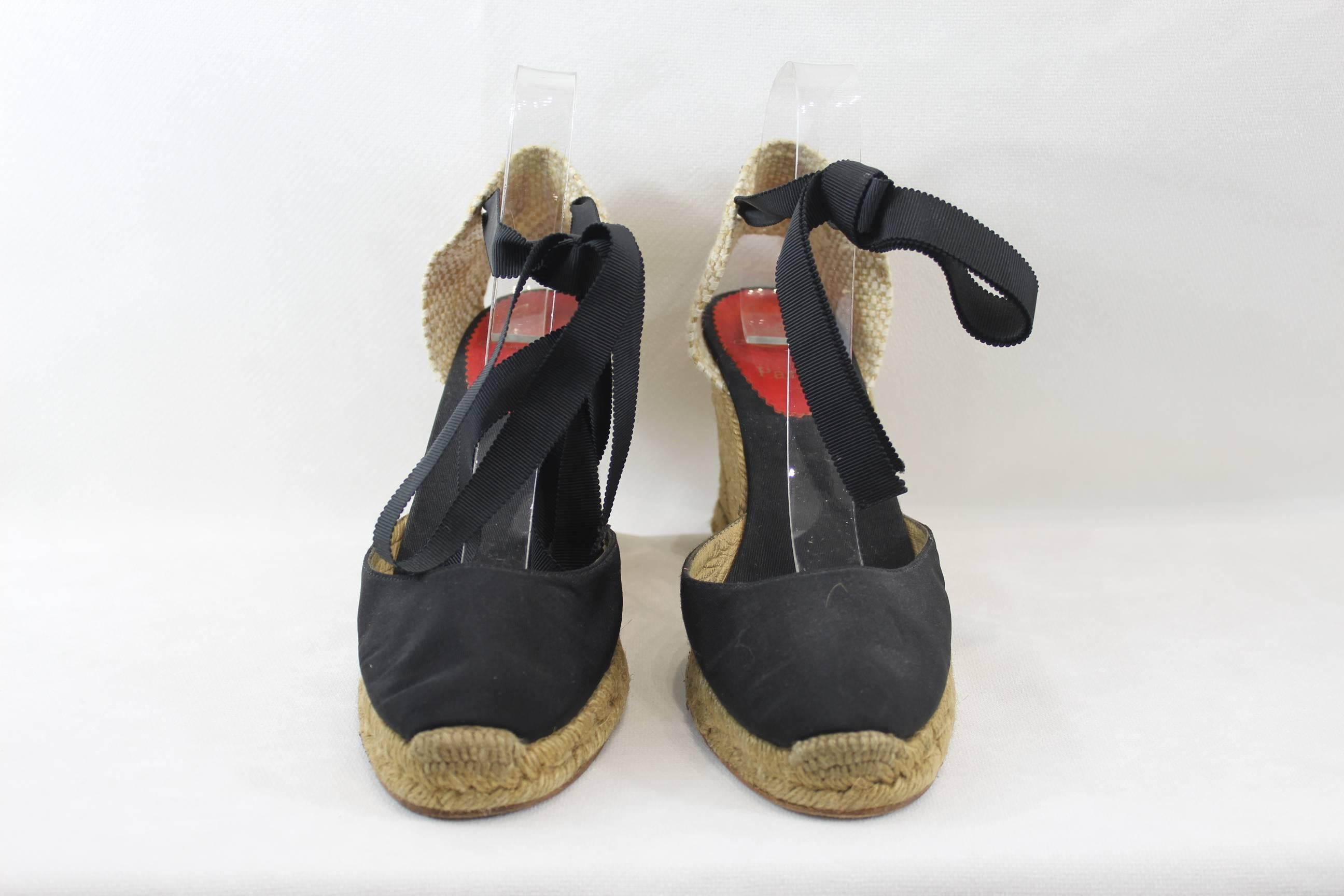 Christian Louboutin nice black canvas  Espadrilles  in blakc leather and cord.

Fair condition, they have been used but they can still be loved.
red sole almost dissapeared.

Size EU 39 