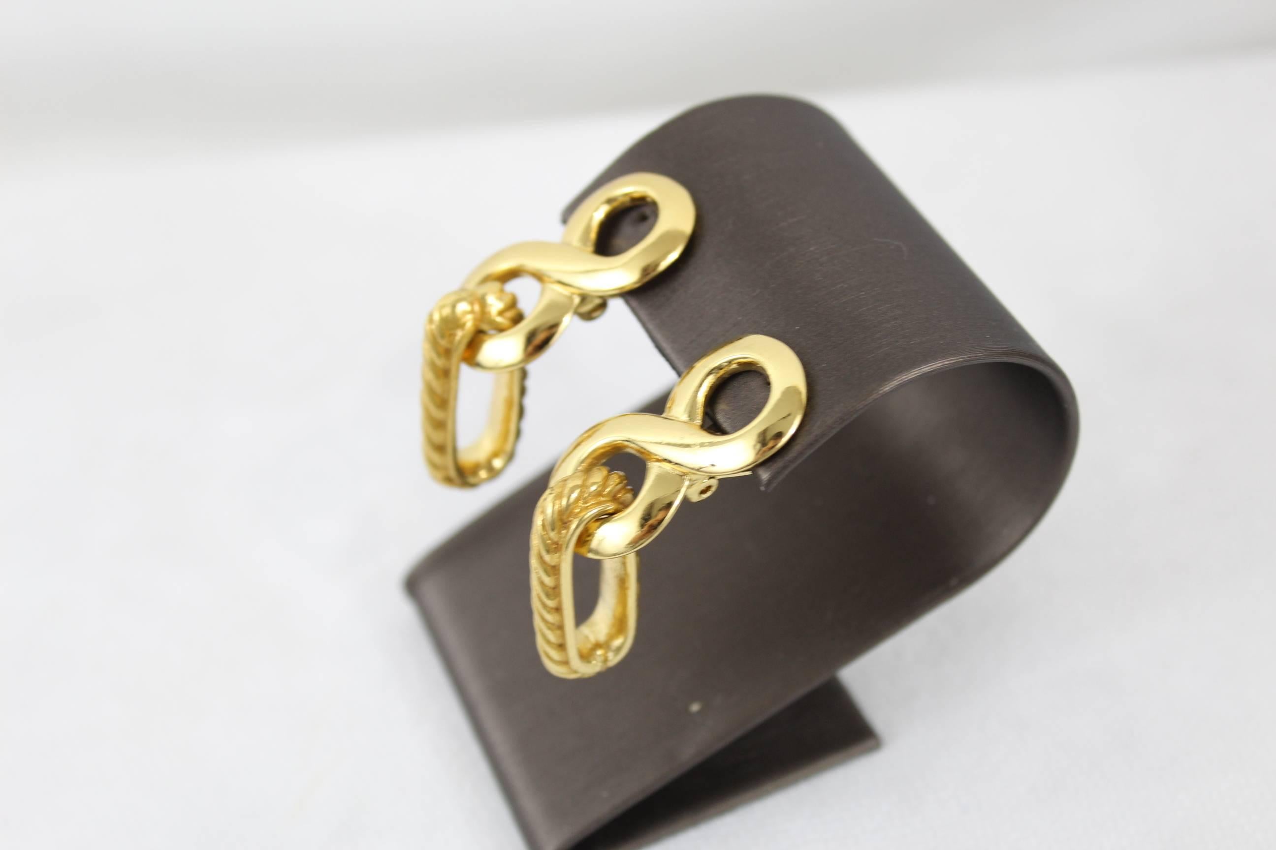 Nice pair of Yves saint Laurent Golden Earrings in really good condition

Total lenght 2